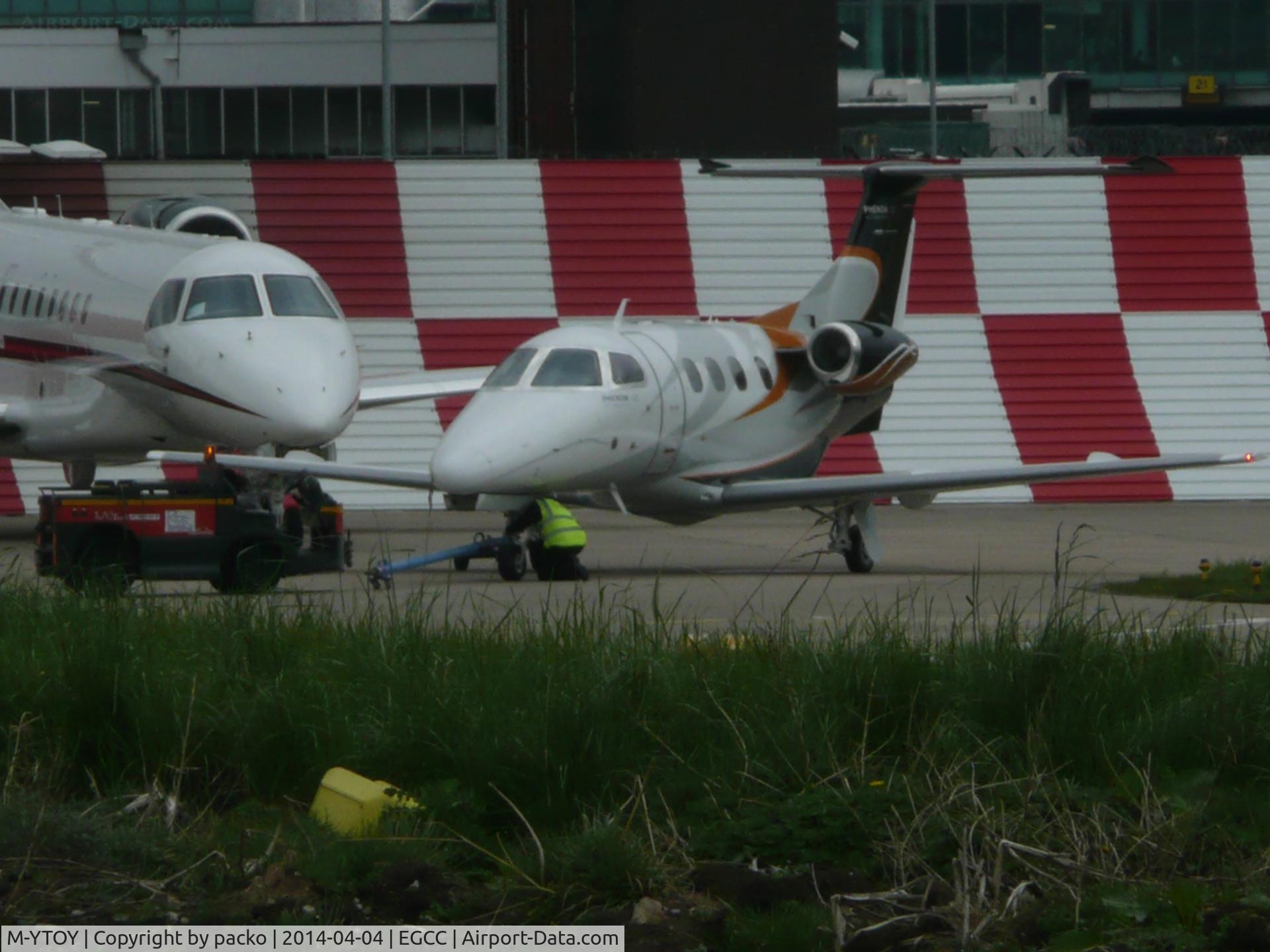 M-YTOY, 2009 Embraer EMB-500 Phenom 100 C/N 50000112, now parked on the OCS RAMP
