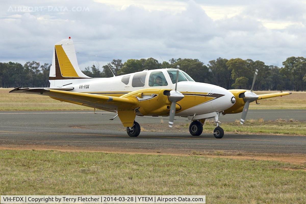 VH-FDX, 1960 Beech B95 Travel Air C/N TD-411, At Temora Airport during the 40th Anniversary Fly-In of the Australian Antique Aircraft Association