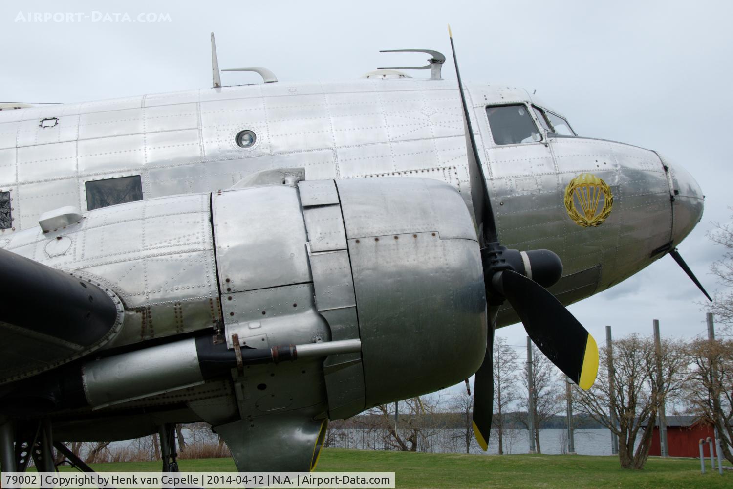 79002, 1943 Douglas C-47A-DL Skytrain C/N 9103, Douglas Tp79 of the Swedish Air Force. It is located near the old parachutist school at the Karlsborg fortress at lake Vättern (in background) and maintained by the Fallskärmsjägarklubben.