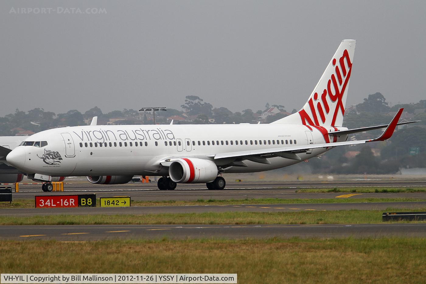 VH-YIL, 2012 Boeing 738-8FE C/N 38713, taxiing from 16R