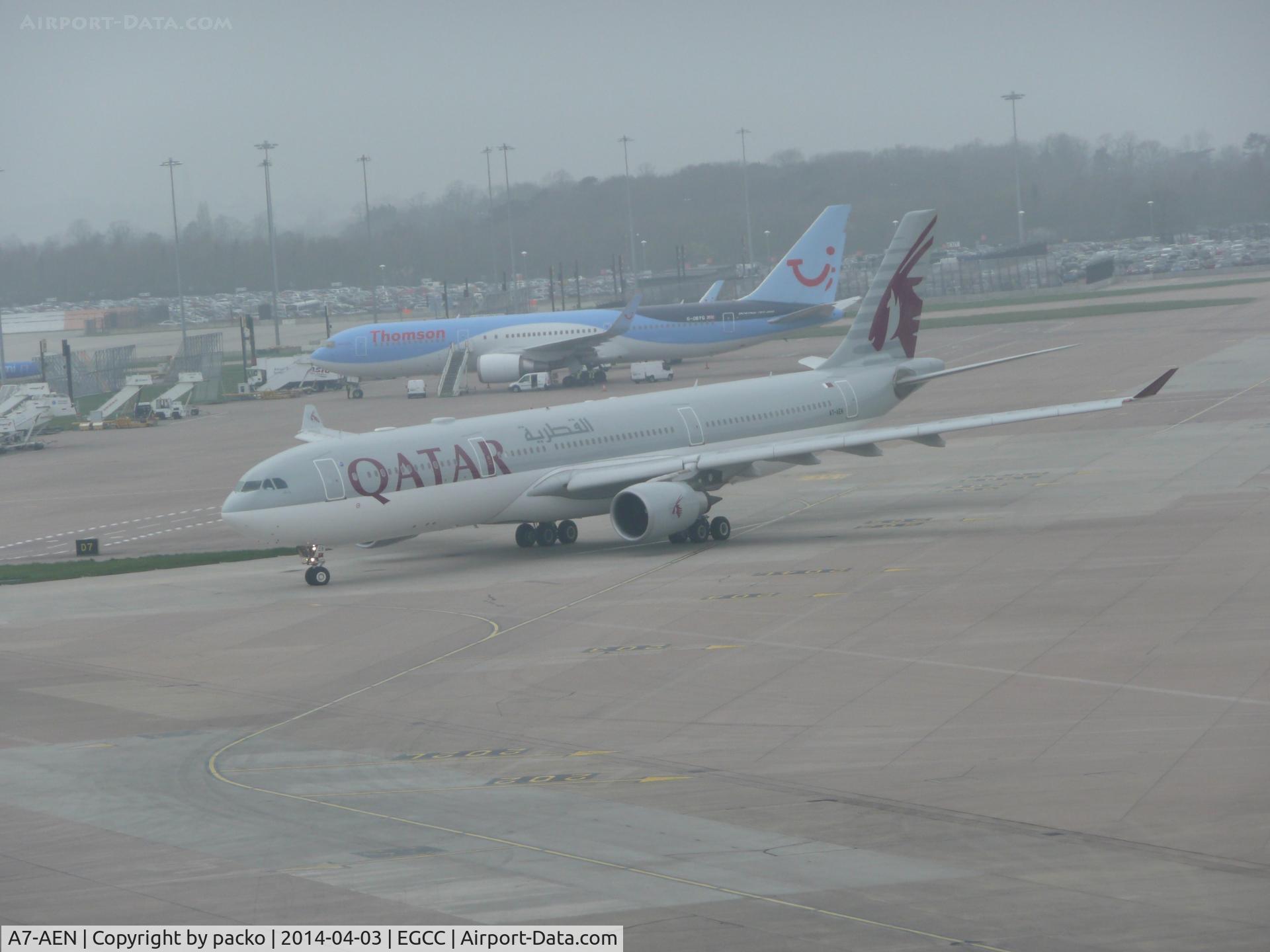 A7-AEN, 2008 Airbus A330-302 C/N 907, aircaft now free from the tug taxing out from T2 for take offphoto taken from the top floor of the carpark.