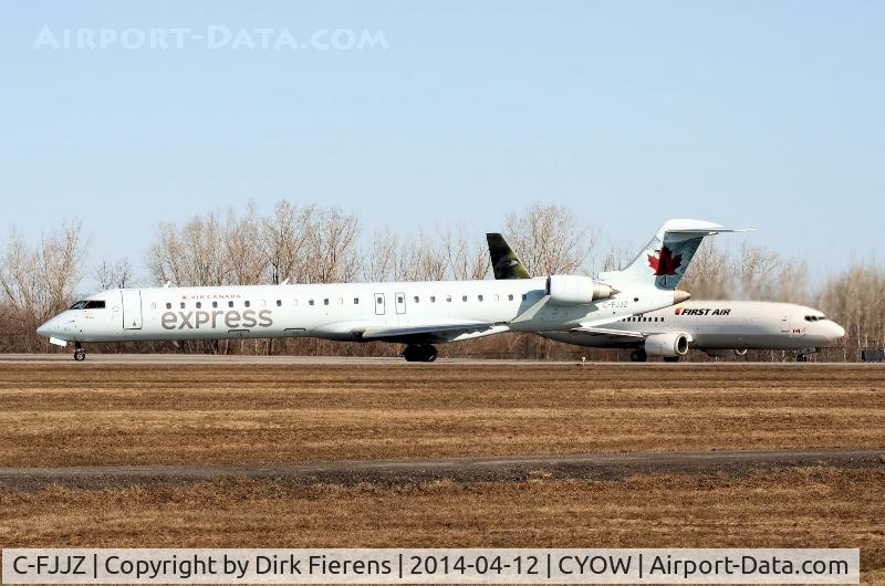 C-FJJZ, 2005 Canadair CRJ-705ER (CL-600-2D15) Regional Jet C/N 15043, Departing for Winnipeg.