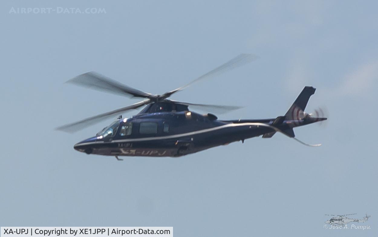 XA-UPJ, AgustaWestland A-109E Power C/N 11658, Flying over Mexico City.