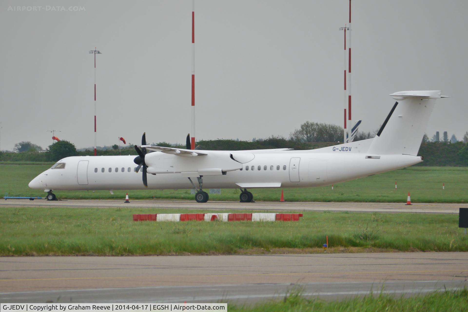 G-JEDV, 2004 De Havilland Canada DHC-8-402Q Dash 8 C/N 4090, Freshly repainted in an all white scheme.