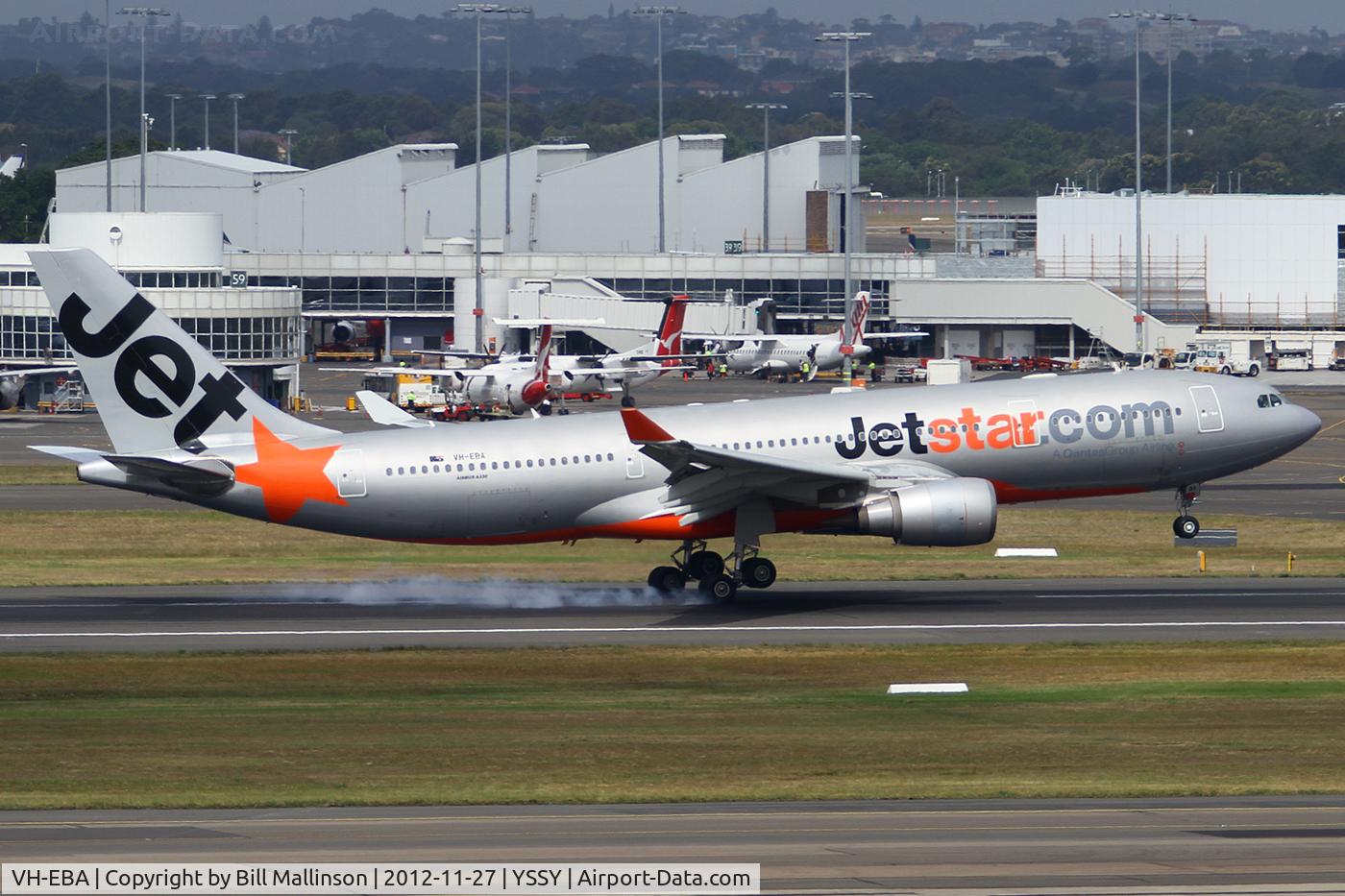 VH-EBA, 2002 Airbus A330-201 C/N 0508, touching on 16R