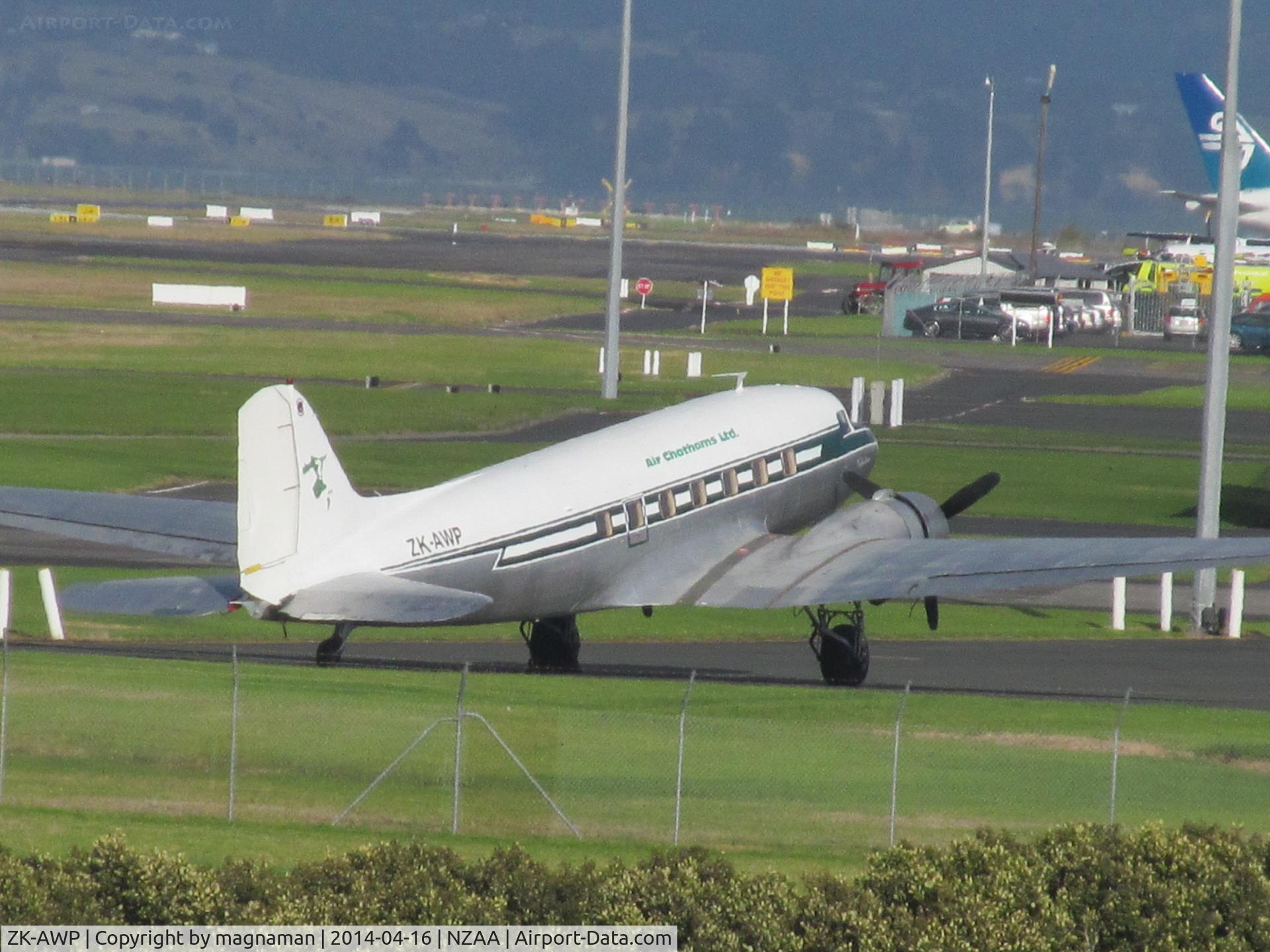 ZK-AWP, 1945 Douglas DC-3 (C-47B-30-DK) C/N 33135, Flying at last - long shot from public viewing area.