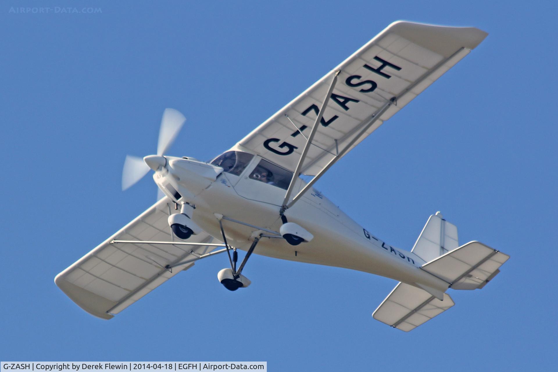 G-ZASH, 2013 Comco Ikarus C42 FB80 C/N 1304-7257, Resident Ikarus seen pulling out from runway 22 at EGFH on a training sortie, student is one of our ex Cadets.
