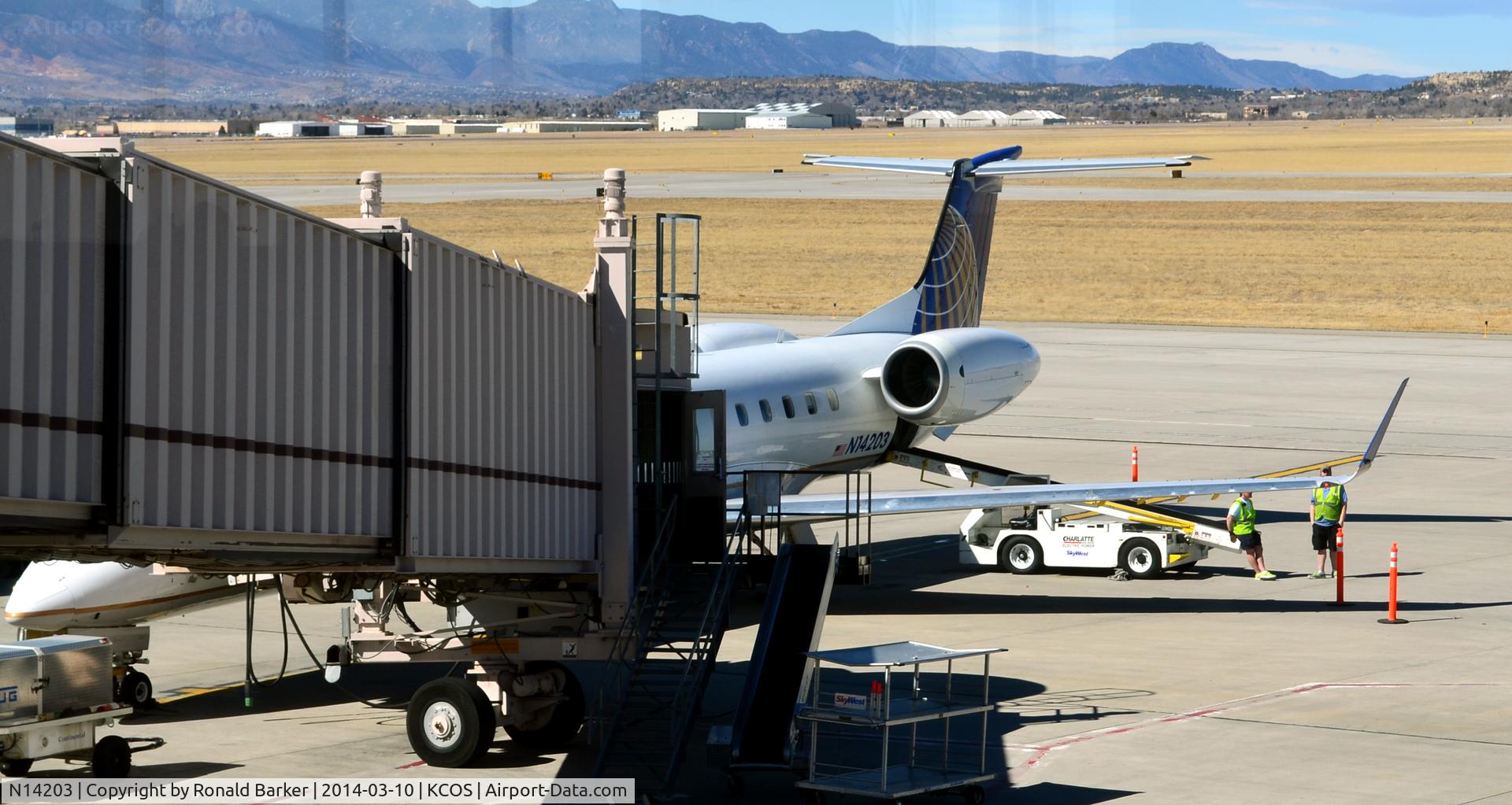 N14203, 2006 Embraer ERJ-145XR (EMB-145XR) C/N 14500964, At the gate Colorado Springs