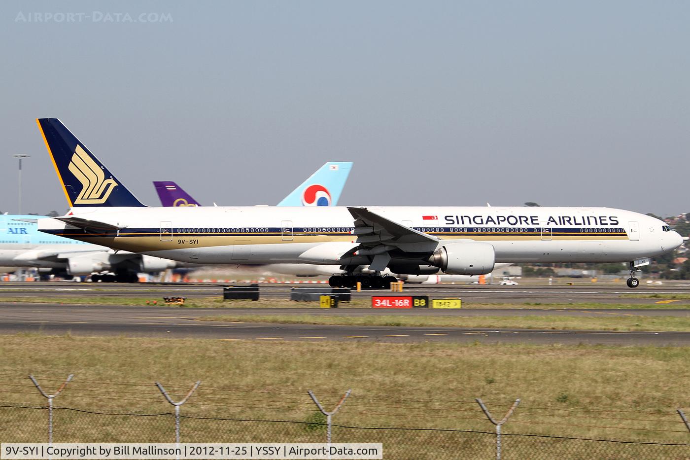 9V-SYI, 2004 Boeing 777-312 C/N 32327, rotating from 34L