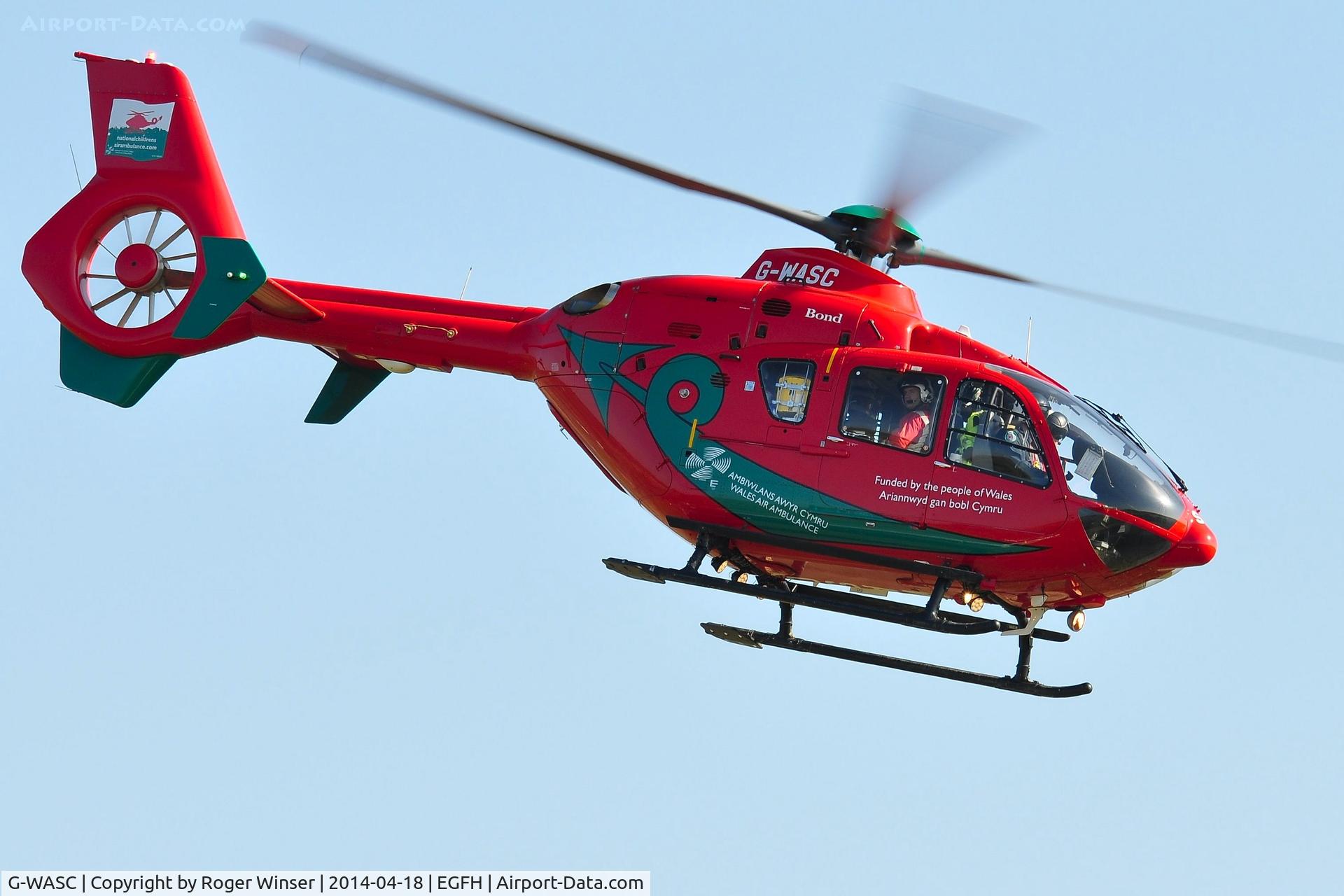 G-WASC, 2012 Eurocopter EC-135T-2+ C/N 1074, Visiting Wales Air Ambulance helicopter departing Swansea Airport for it's Welshpool Airport base.