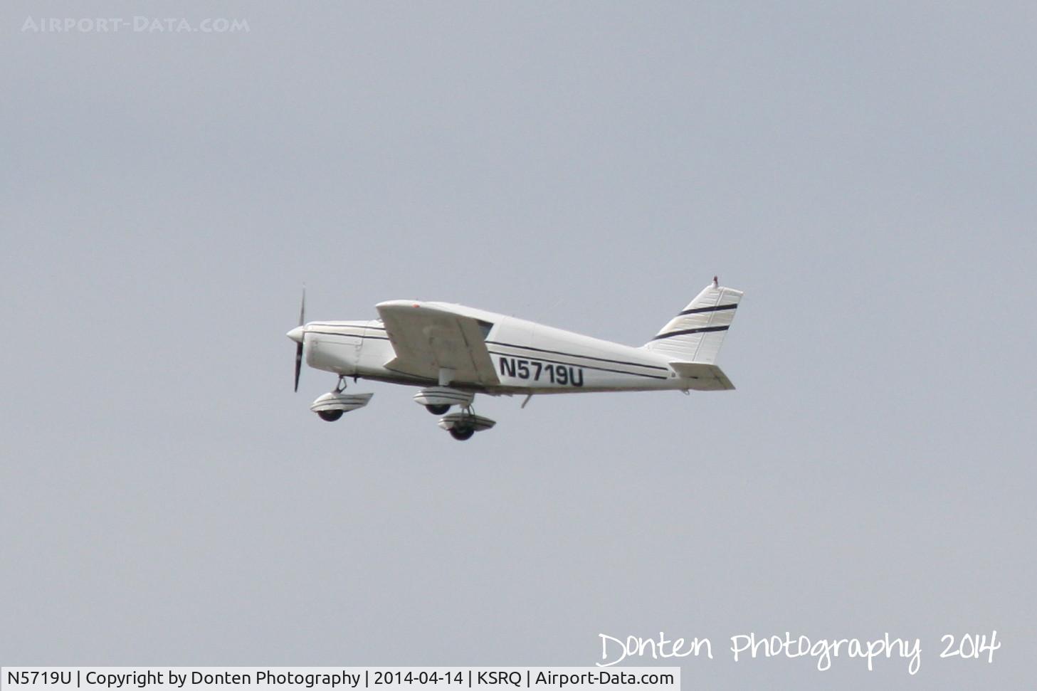 N5719U, 1969 Piper PA-28-140 C/N 28-26519, Piper Cherokee (N5719U) departs Sarasota-Bradenton International Airport