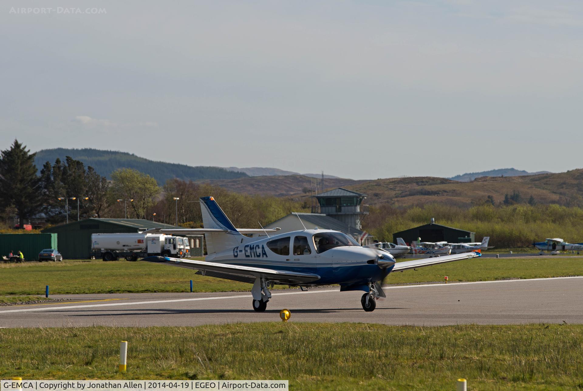 G-EMCA, 1999 Rockwell Commander 114B C/N 14661, Preparing to depart from Oban Airport.