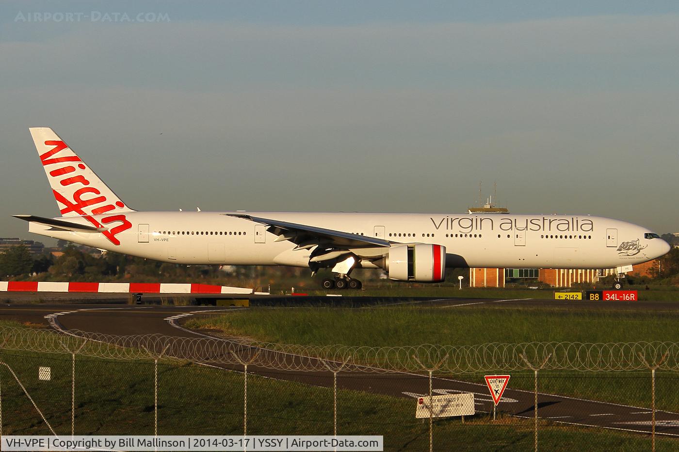 VH-VPE, 2009 Boeing 777-3ZG/ER C/N 37939, just down onto 34L