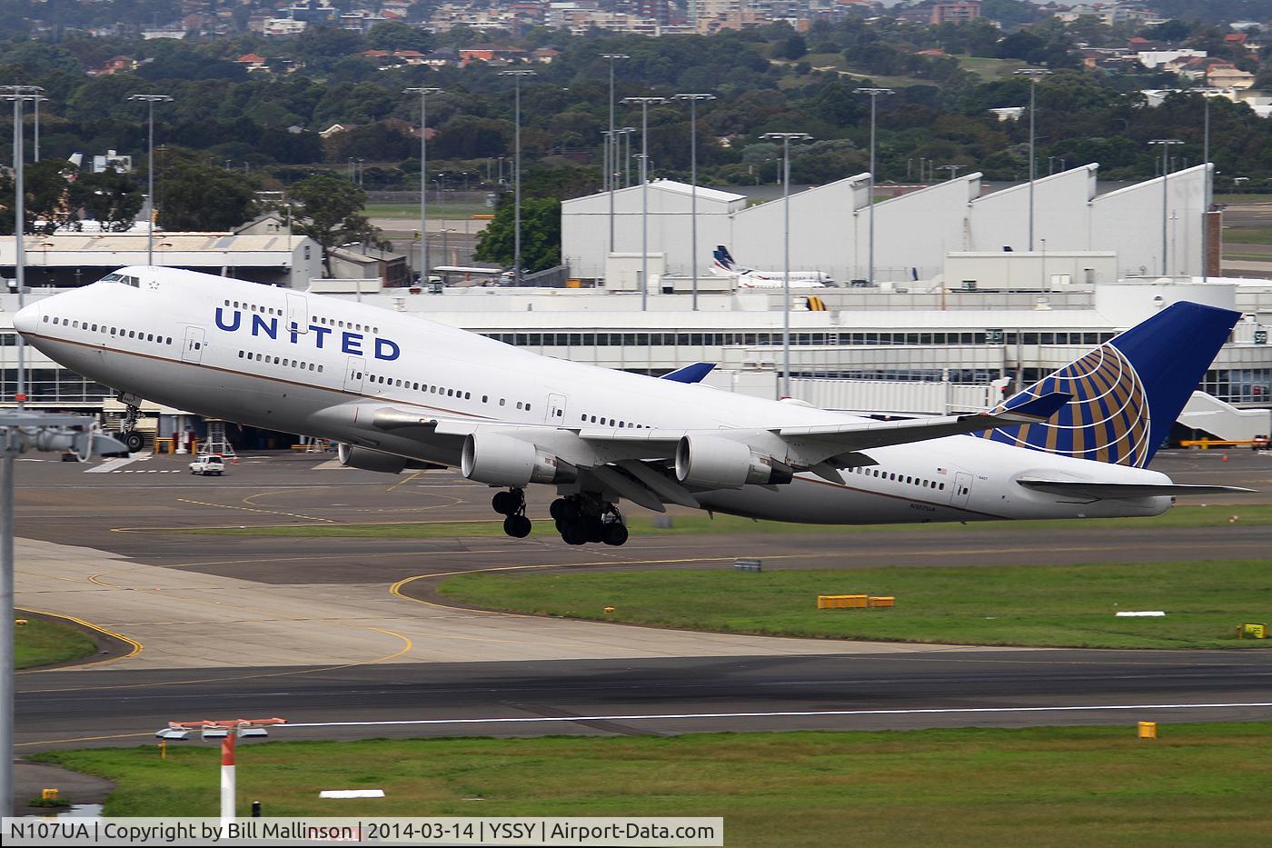 N107UA, 1998 Boeing 747-422 C/N 26900, off from 34L