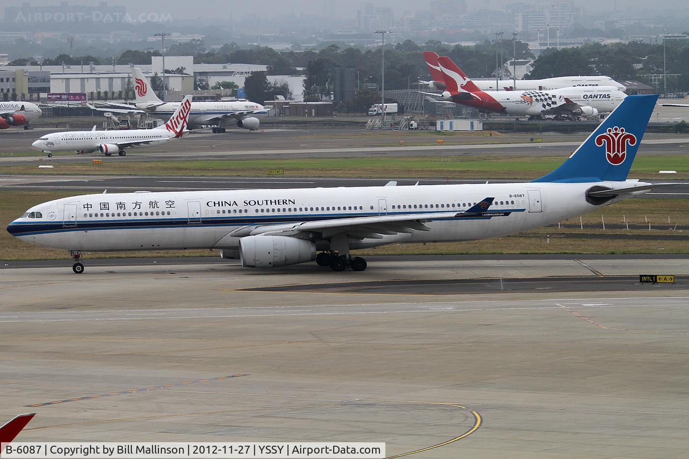 B-6087, 2007 Airbus A330-343E C/N 889, taxi to 16R