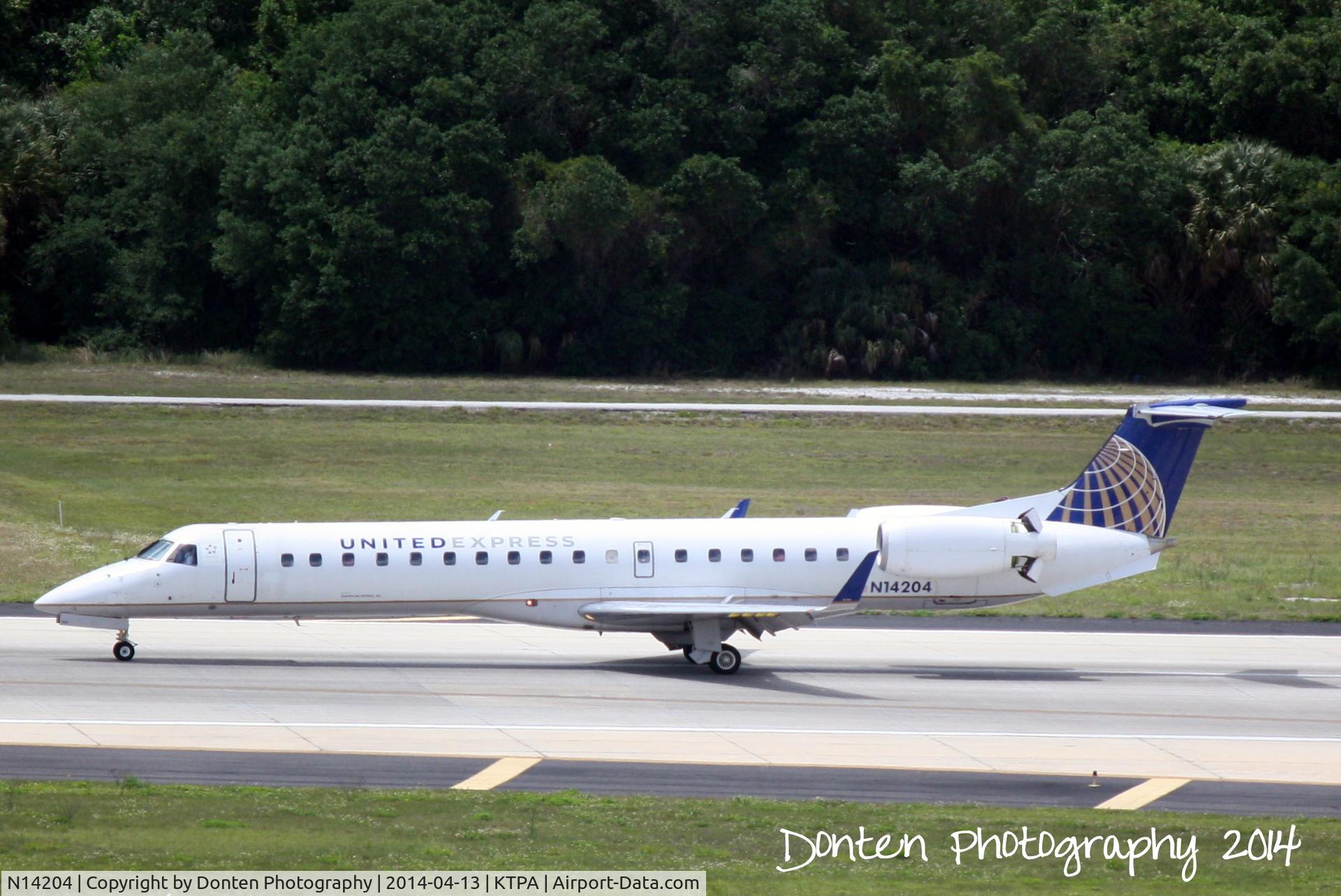 N14204, 2006 Embraer ERJ-145XR (EMB-145XR) C/N 14500968, United Flight 4318 operated by Express Jet (N14204) arrives at Tampa International Airport following a flight from Cleveland-Hopkins International Airport