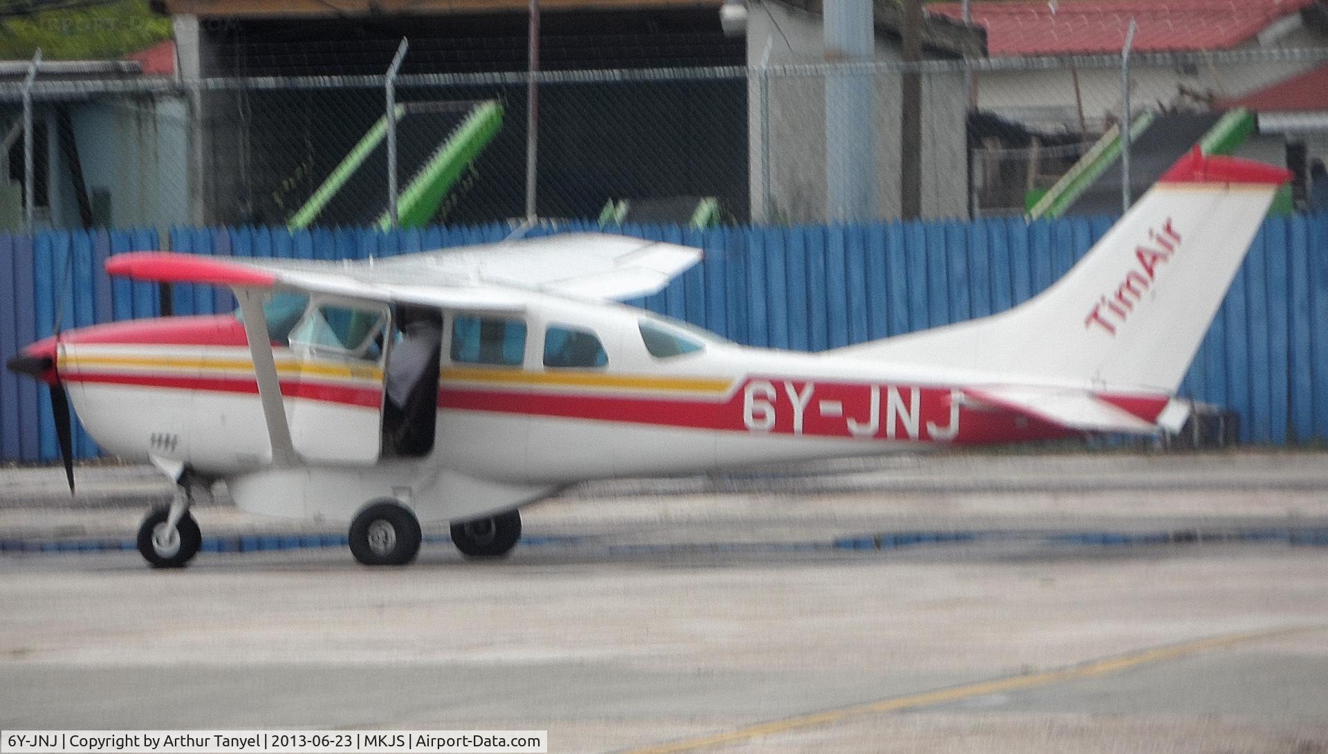 6Y-JNJ, 1981 Cessna U206G Stationair C/N U20606359, On tarmac @ MJKS
