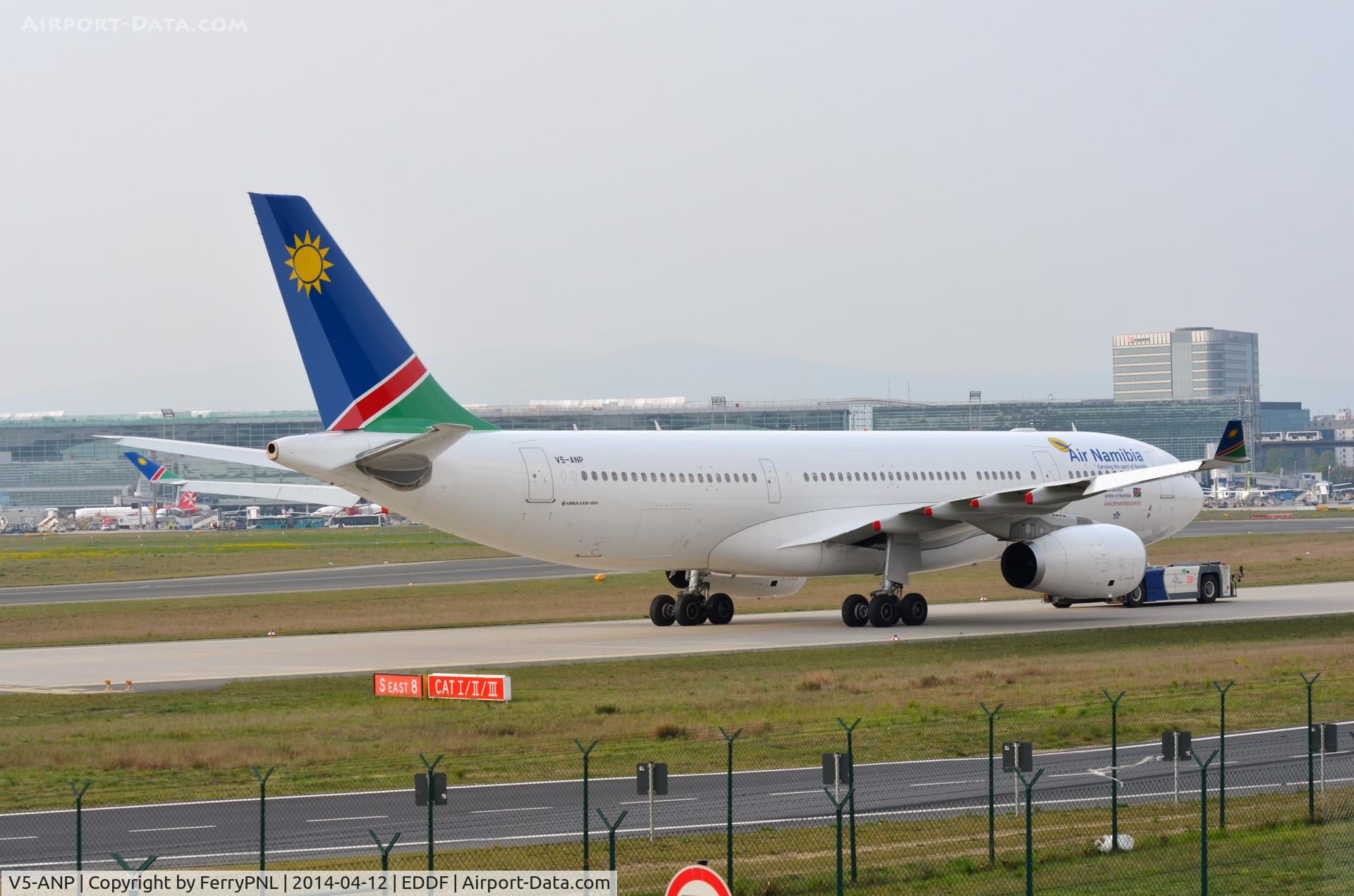 V5-ANP, 2013 Airbus A330-243 C/N 1466, Air Namibia A332 being towed to the terminal.