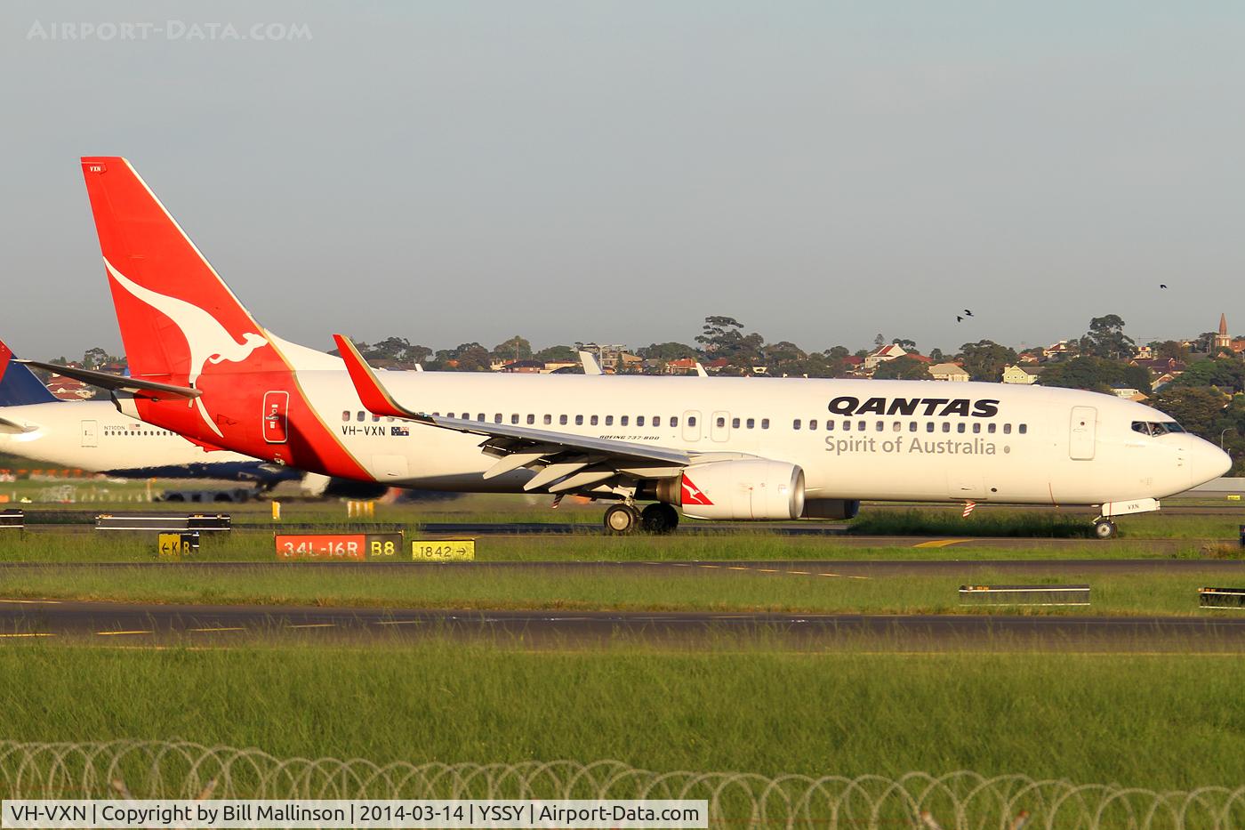 VH-VXN, 2002 Boeing 737-838 C/N 33484, taxiing from 34R