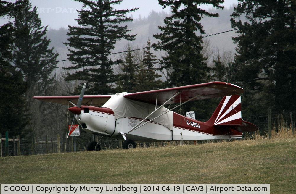 C-GOOJ, 1978 Bellanca 7GCBC C/N 1062 78, Tied down on the grass at 100 Mile House, BC, in April, with a light snow falling.