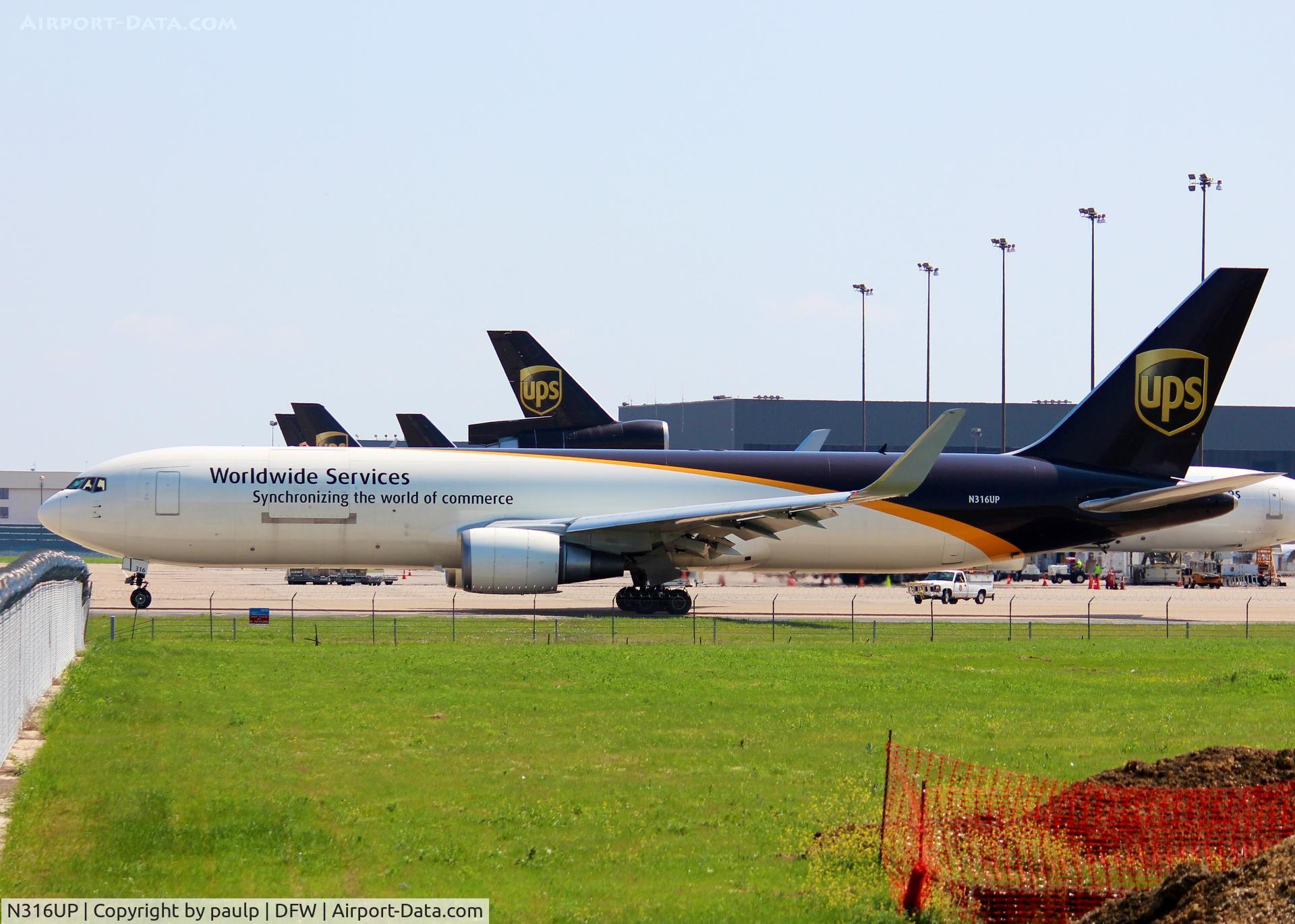 N316UP, 1997 Boeing 767-34AF C/N 27744, Taxiing to take off from the UPS ramp at DFW