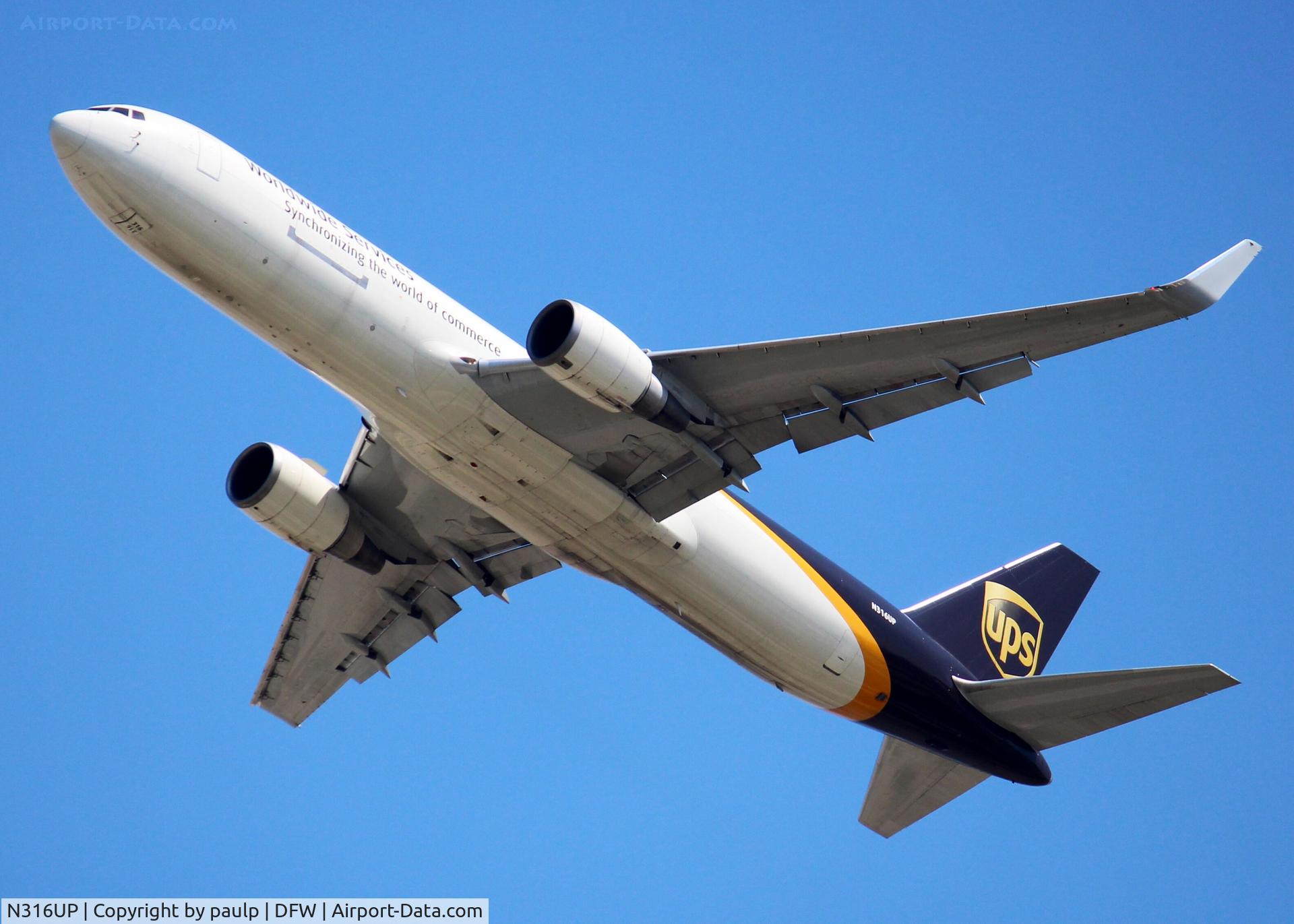 N316UP, 1997 Boeing 767-34AF C/N 27744, Beautiful 767 departing DFW.