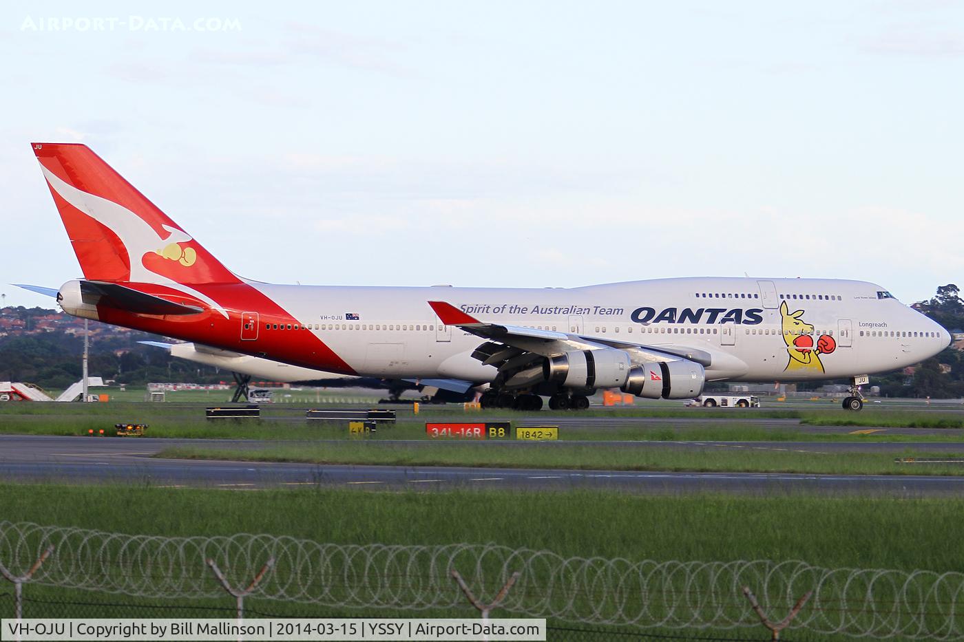 VH-OJU, 1999 Boeing 747-438 C/N 25566, taxiing from 34L