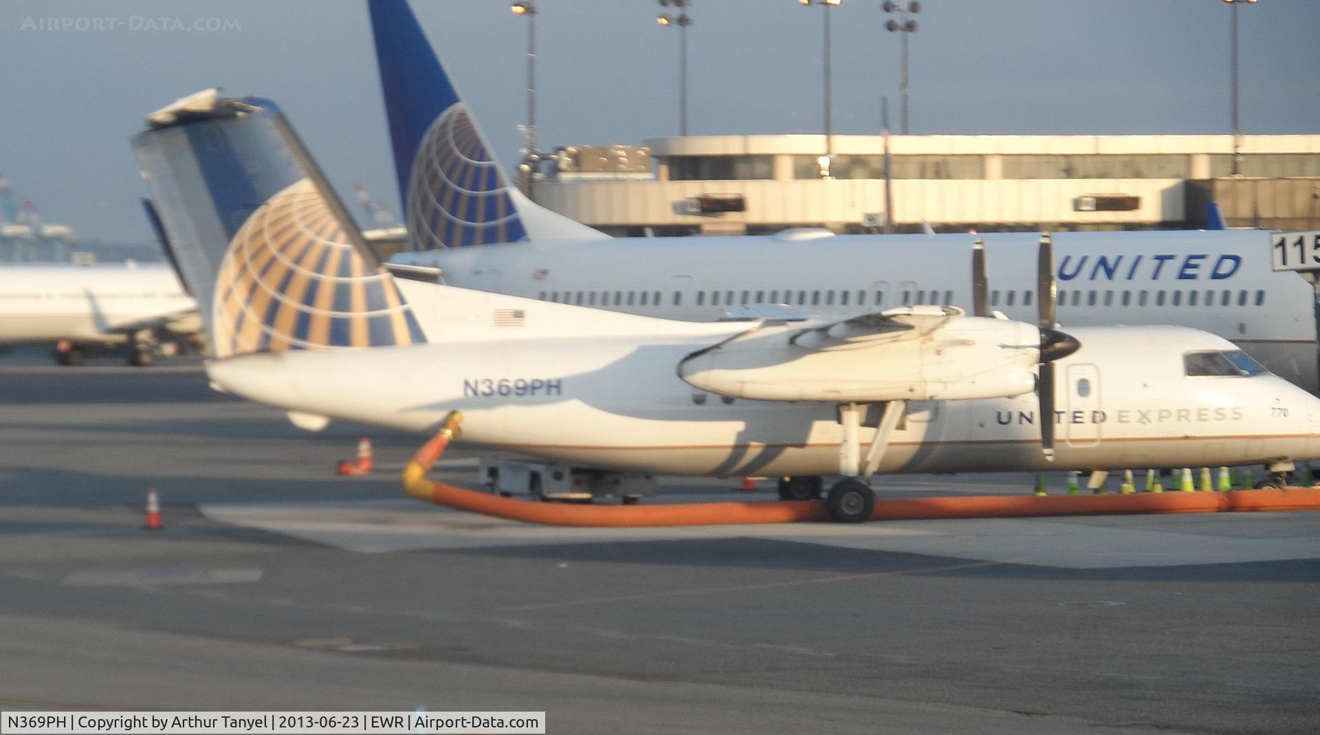 N369PH, 1998 Bombardier DHC-8-202 Dash 8 C/N 513, On tarmac @ EWR