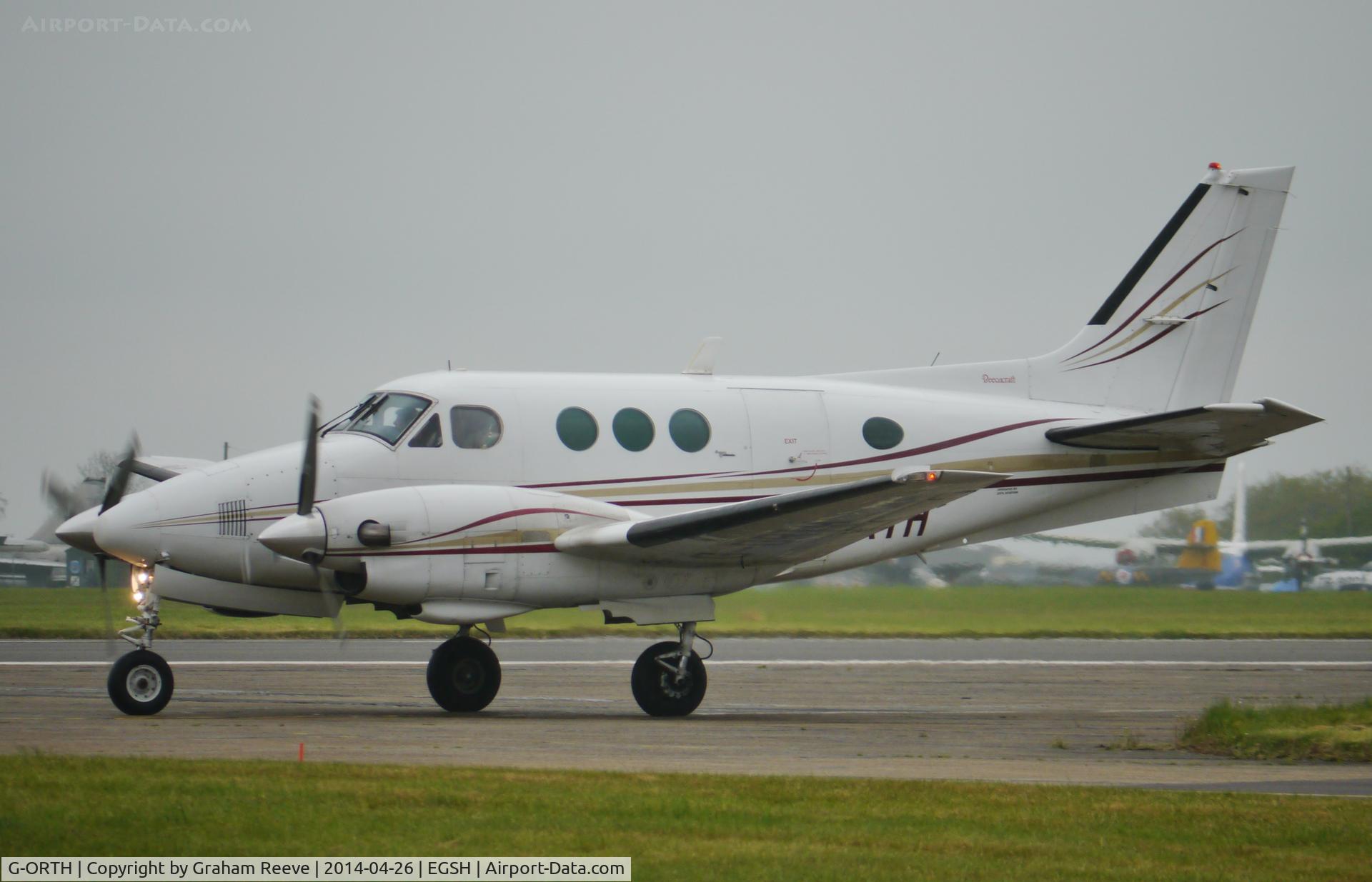 G-ORTH, 1975 Beech E90 King Air C/N LW-136, About to depart.