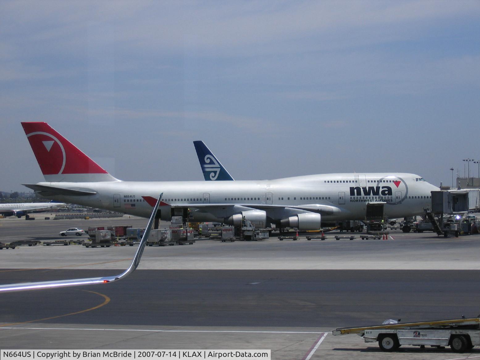 N664US, 1989 Boeing 747-451 C/N 23819, Northwest Airlines. 747-451. N664US 6304 cn 23819 721. Los Angeles - International (LAX KLAX). Image © Brian McBride. 14 July 2007