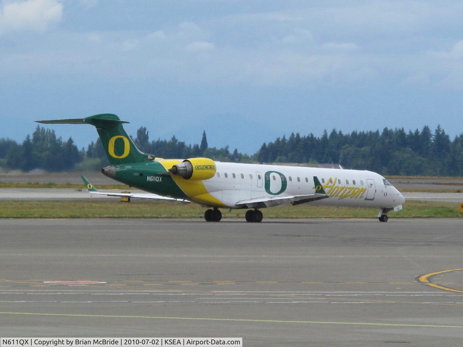 N611QX, Bombardier CRJ-701 (CL-600-2C10) Regional Jet C/N 10041, Horizon Air. Canadair CL-600-2C10 Regional Jet CRJ-701. N611QX cn 10041. Seattle Tacoma - International (SEA KSEA). Image © Brian McBride. 02 July 2010