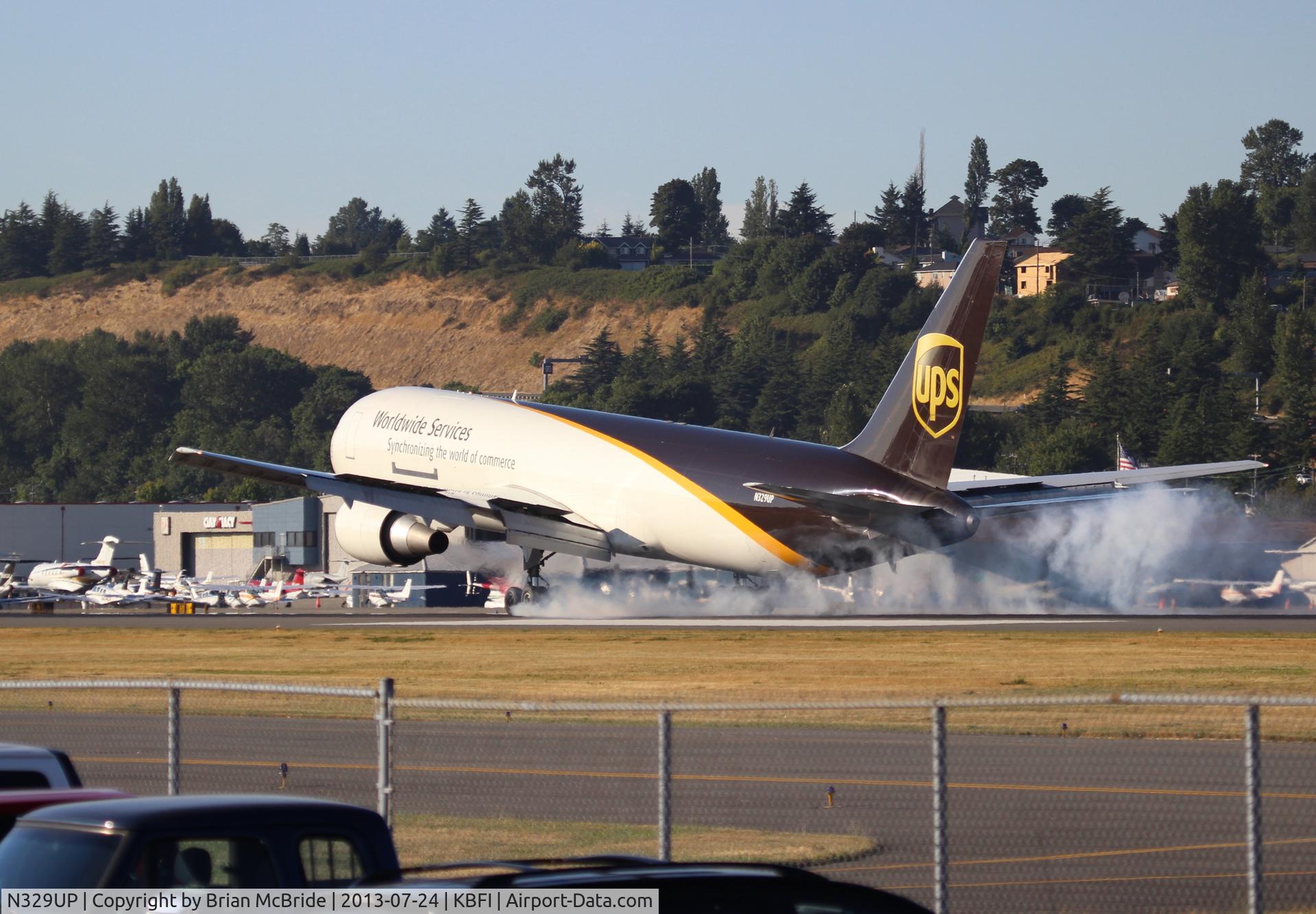 N329UP, 1999 Boeing 767-34AF C/N 27755, UPS. 767-34AFER. N329UP cn 27755 756. Seattle - Boeing Field King County International (BFI KBFI). Image © Brian McBride. 24 July 2013