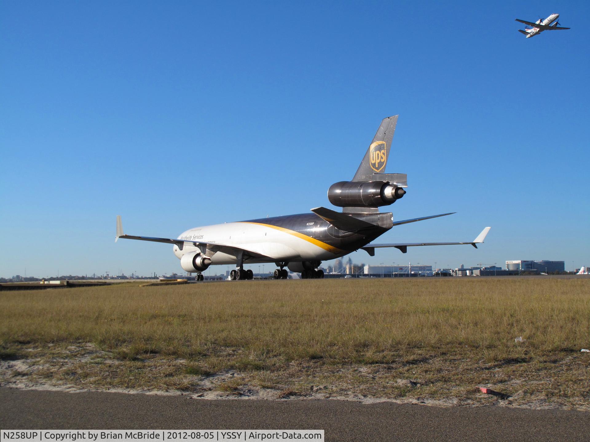 N258UP, 1991 McDonnell Douglas MD-11F C/N 48416, UPS. MD-11. N258UP cn 48416 466. Sydney - Kingsford Smith International (Mascot) (SYD YSSY). Image © Brian McBride. 05 August 2012