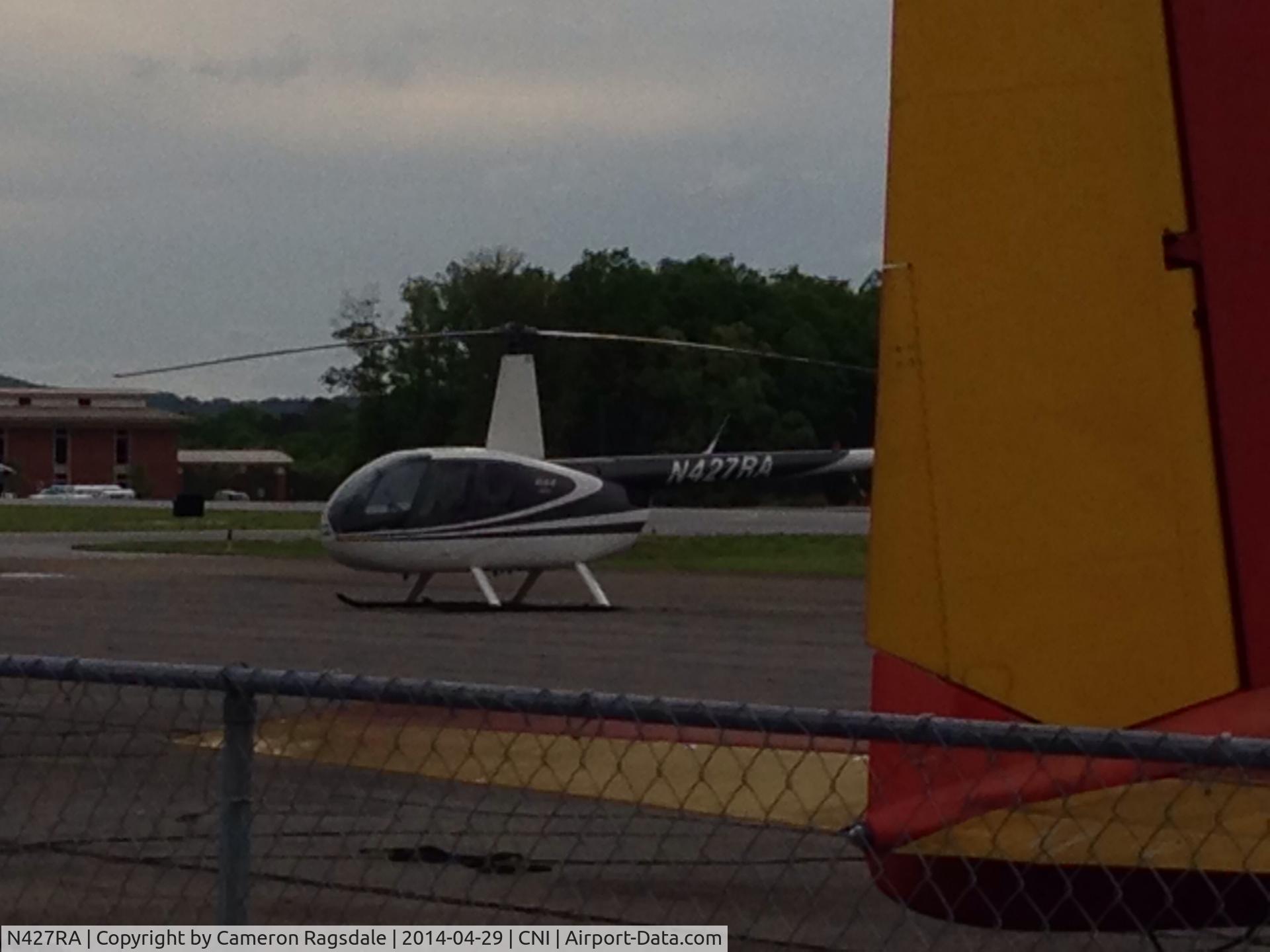 N427RA, 1994 Robinson R44 C/N 0067, Sitting on the ramp at KCNI