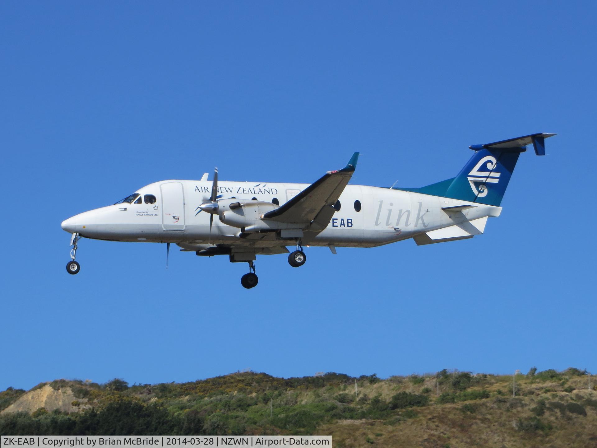 ZK-EAB, 2001 Raytheon 1900D C/N UE-425, Air New Zealand (Eagle Airways). Raytheon 1900D. ZK-EAB cn UE-425. Wellington - International (WLG NZWN). Image © Brian McBride. 28 March 2014