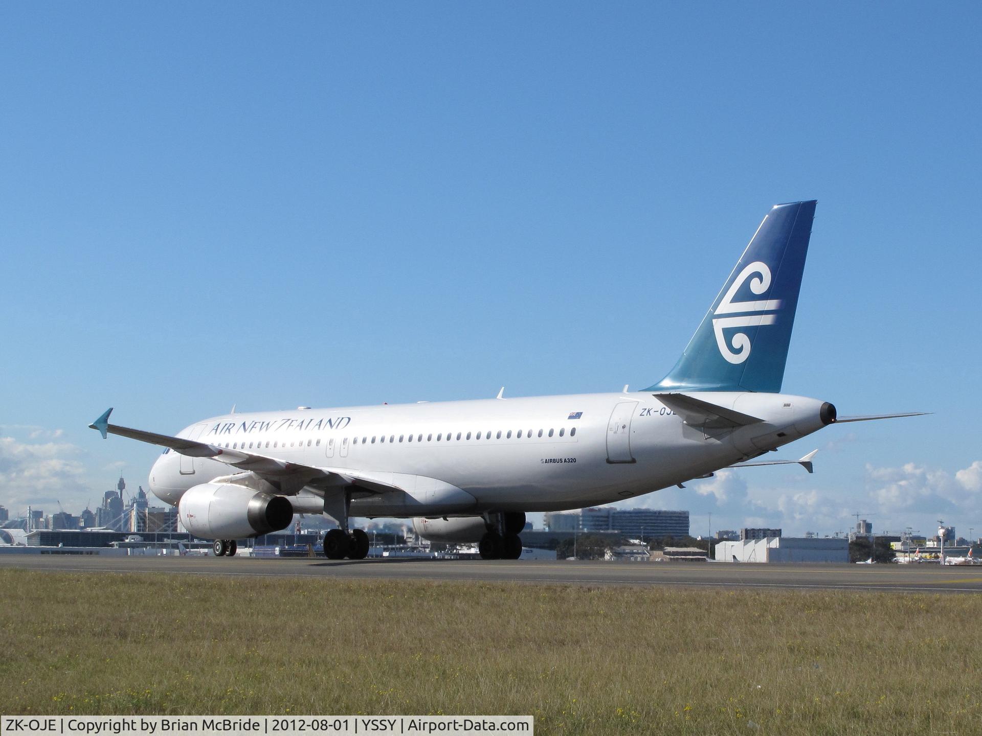 ZK-OJE, 2003 Airbus A320-232 C/N 2148, Air New Zealand. A320-232. ZK-OJE cn 2148. Sydney - Kingsford Smith International (Mascot) (SYD YSSY). Image © Brian McBride. 01 August 2012