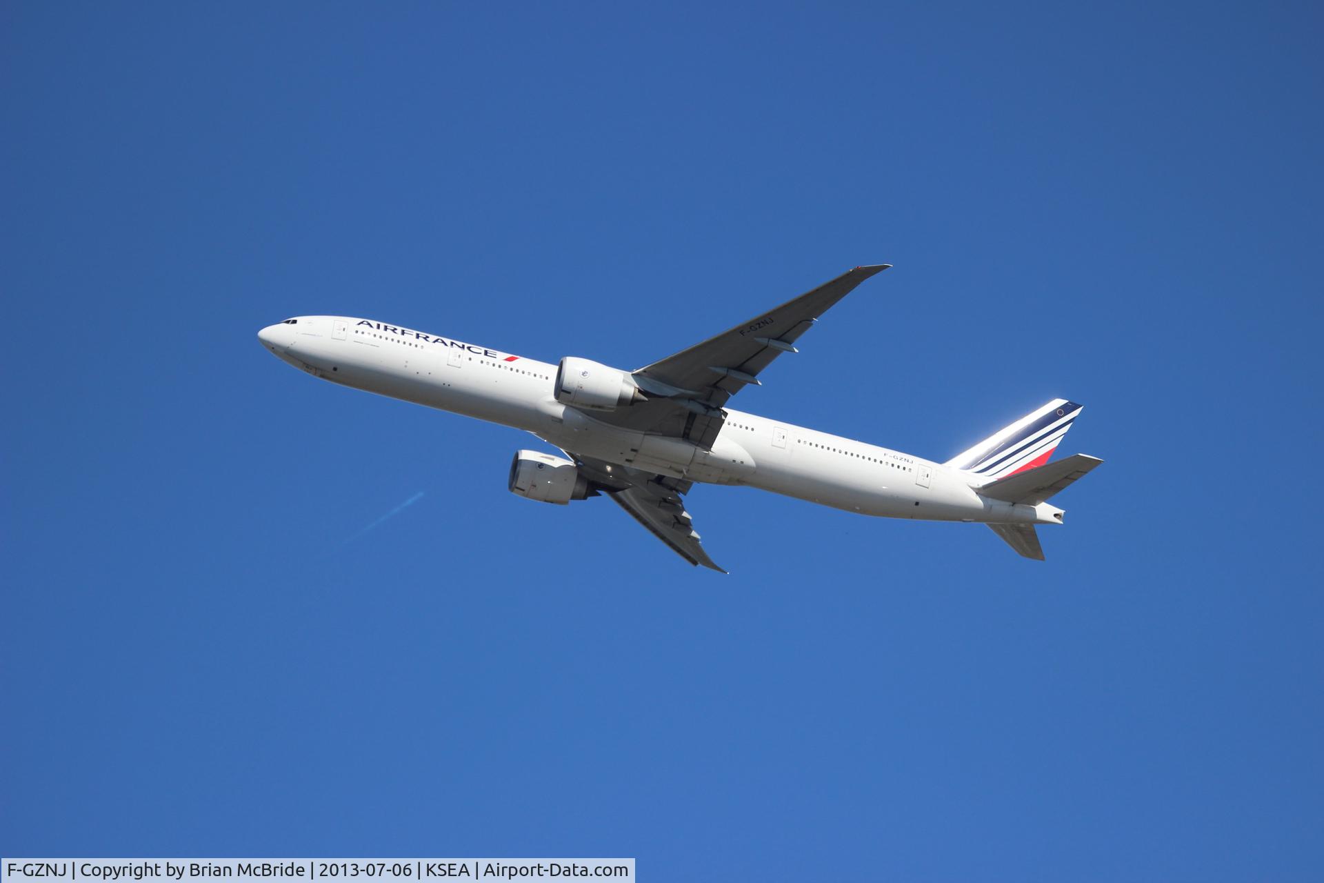 F-GZNJ, 2011 Boeing 777-328/ER C/N 38706, Air France. 777-328ER. F-GZNJ cn 38706 928. Seattle Tacoma - International (SEA KSEA). Image © Brian McBride. 06 July 2013