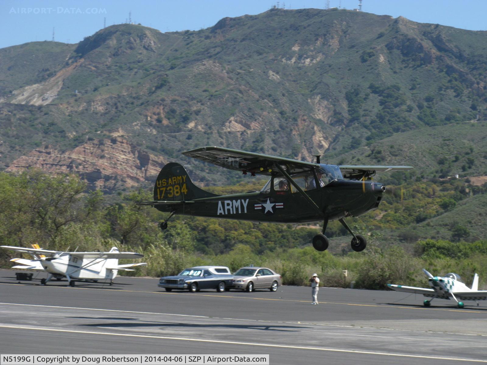N5199G, 1953 Cessna 305A C/N 22118, 1953 Cessna 305A O-1 BIRD DOG, Continental O-470-11 213 Hp, takeoff climb Rwy 22