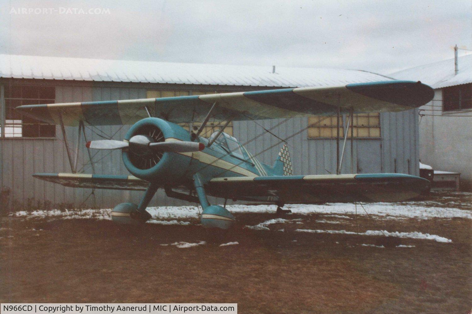 N966CD, 1942 Boeing A75N1(PT17) C/N 75-3388, 1942 Boeing A75N1(PT17), c/n: 75-3388.  With modifications, enclosed cockpit.  Parked outside of Northland Aviation.  Early 1990's.