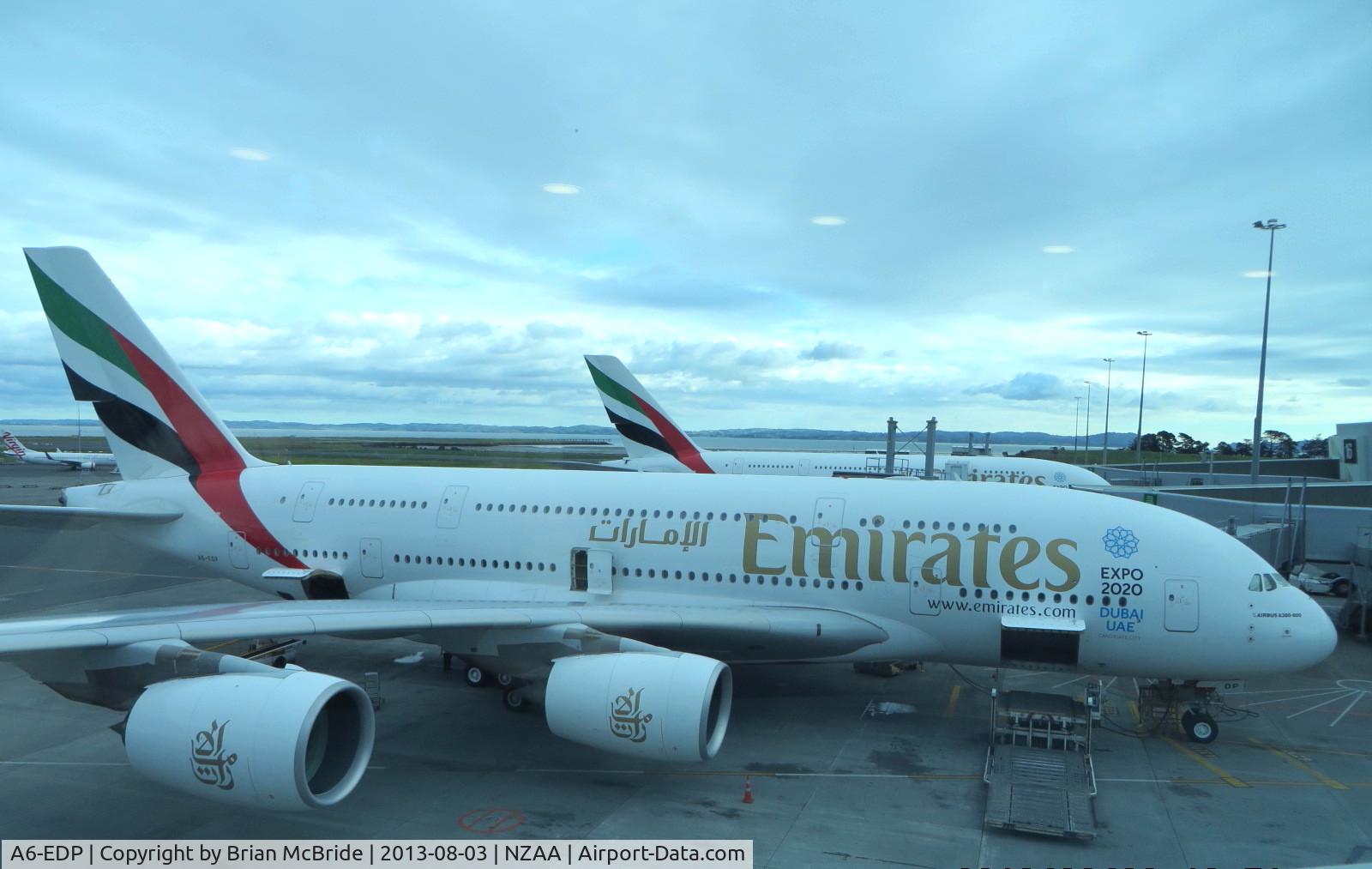 A6-EDP, 2011 Airbus A380-861 C/N 077, Emirates. A380-861. A6-EDP cn 077. Sister Ship A6-EDE behind her. Auckland - International (AKL NZAA). Image © Brian McBride. 03 August 2013