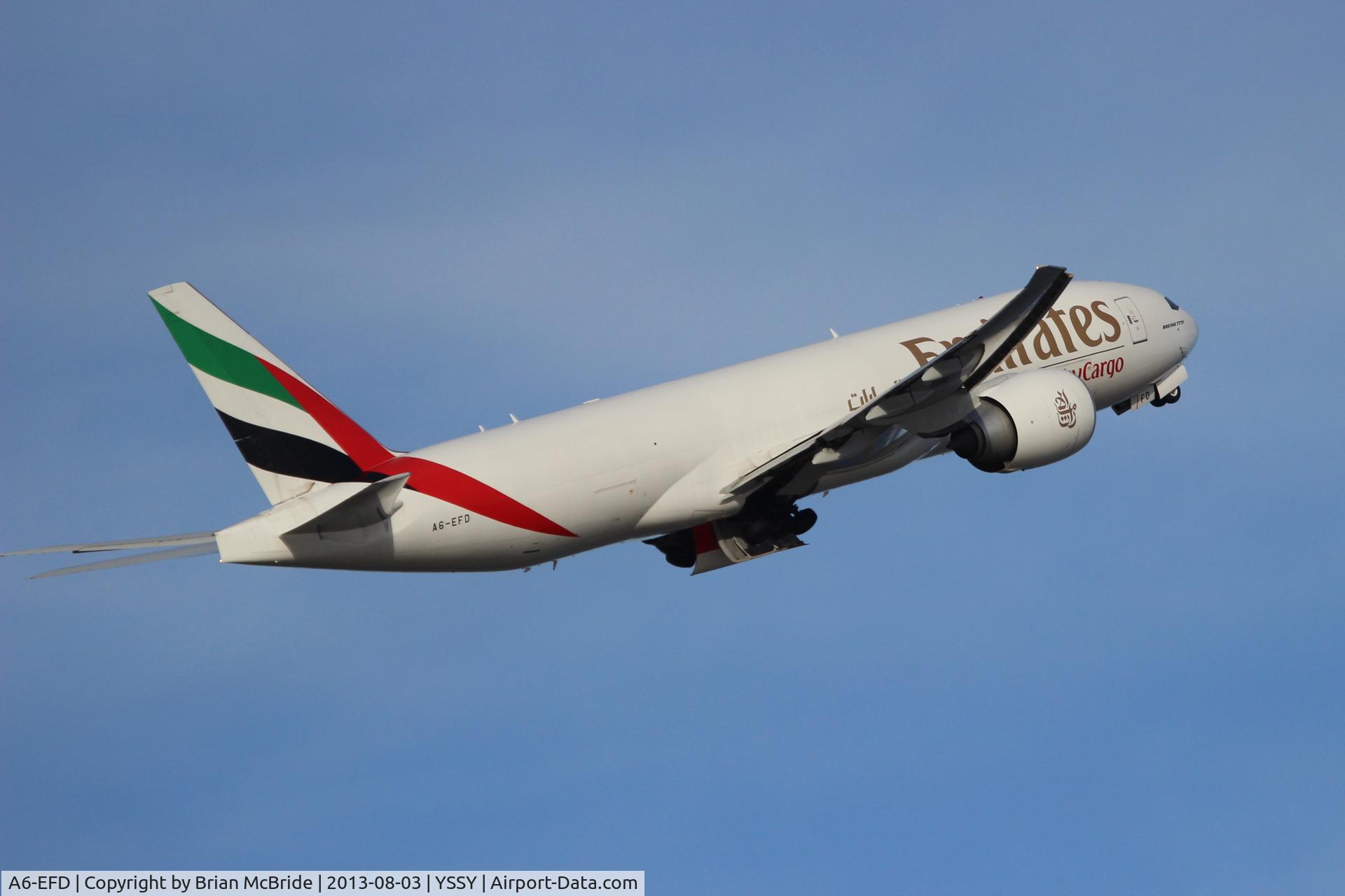 A6-EFD, 2009 Boeing 777-F1H C/N 35606, Emirates SkyCargo. 777-F1H. A6-EFD cn 35606 766. Sydney - Kingsford Smith International (Mascot) (SYD YSSY). Image © Brian McBride. 03 August 2013