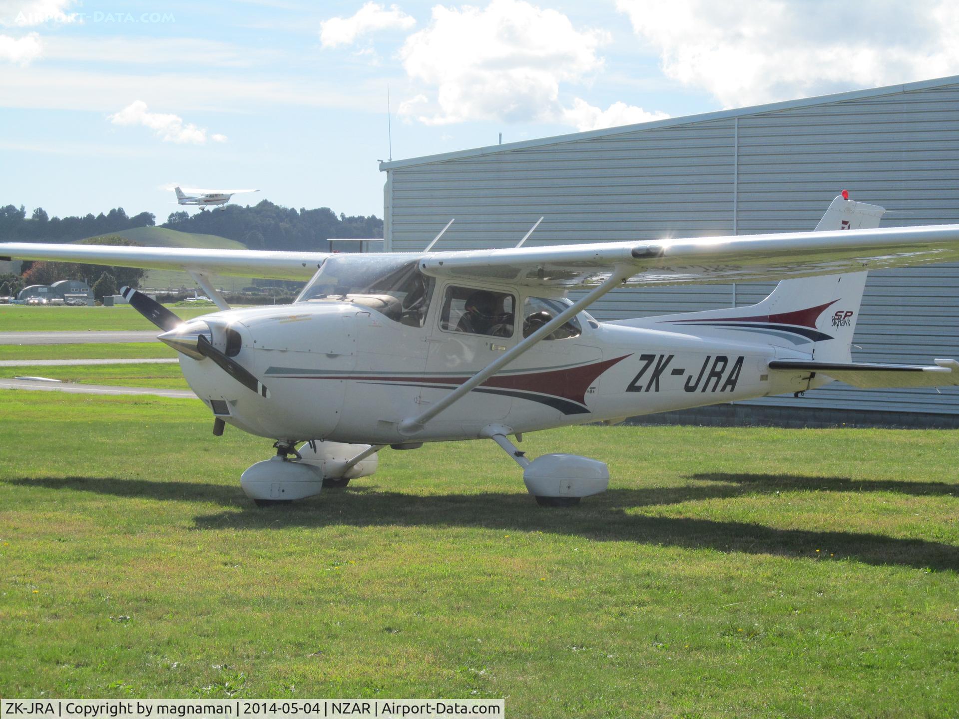 ZK-JRA, Cessna 172S C/N 172S9767, On flying club grass by café - great fruit smoothies!!