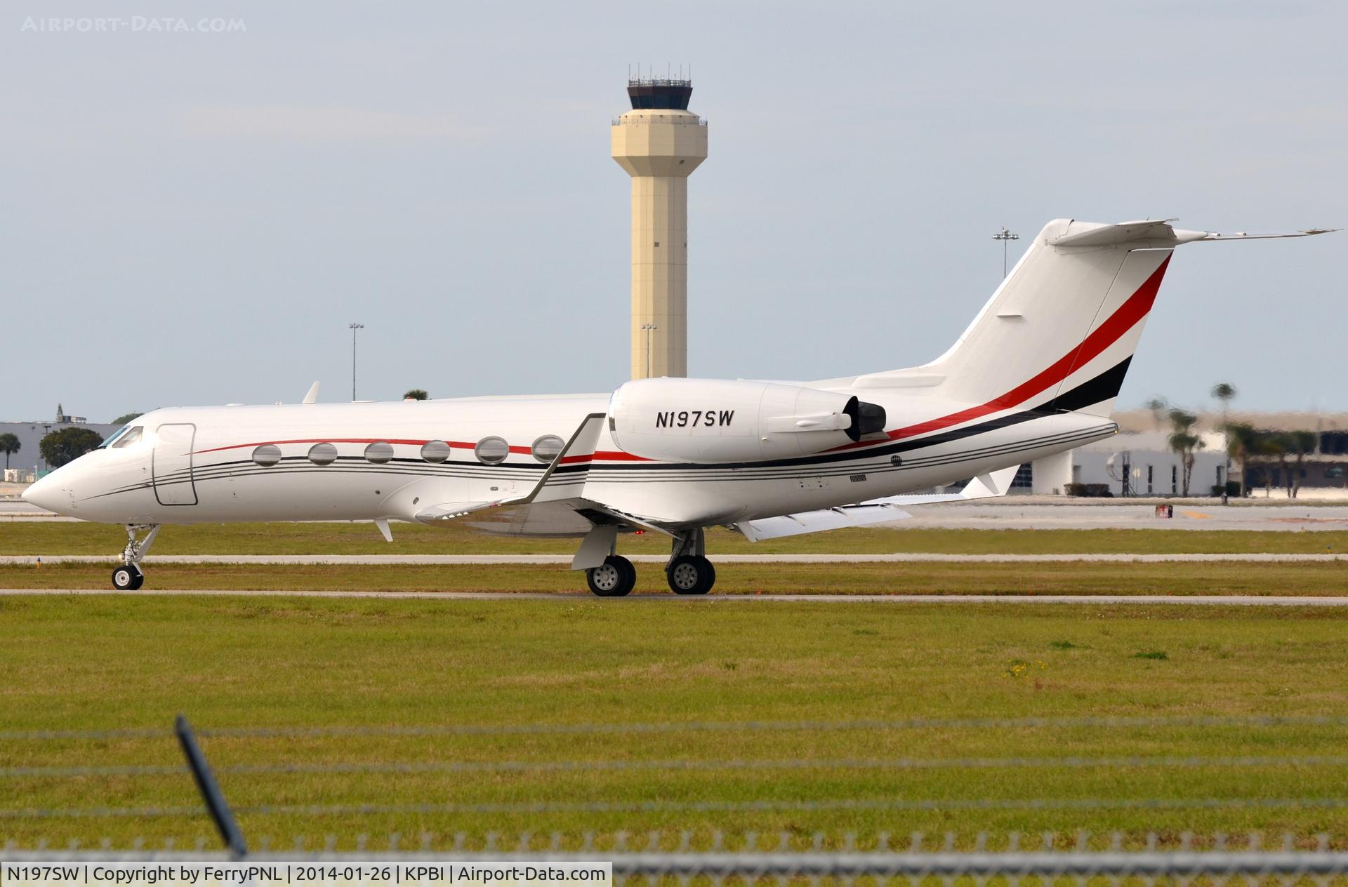 N197SW, 2000 Gulfstream Aerospace G-IV C/N 1413, Gulfstream 4 in front of PBI tower