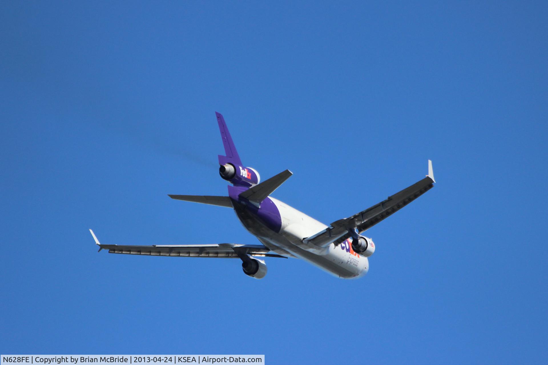 N628FE, 1991 McDonnell Douglas MD-11F C/N 48447, FedEx Express. MD-11F. N628FE cn 48447 464. Seattle Tacoma - International (SEA KSEA). Image © Brian McBride. 24 April 2013