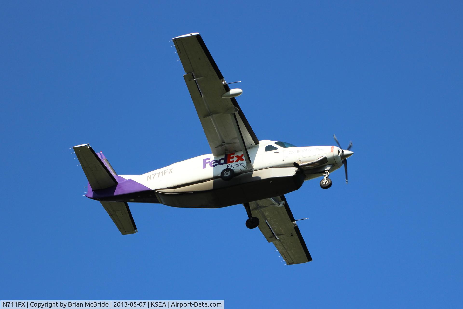 N711FX, 1995 Cessna 208B C/N 208B0433, FedEx Feeder (Empire Airlines). Cessna 208B Super Cargomaster. N711FX cn 208B0433. Seattle Tacoma - International (SEA KSEA). Image © Brian McBride. 07 May 2013