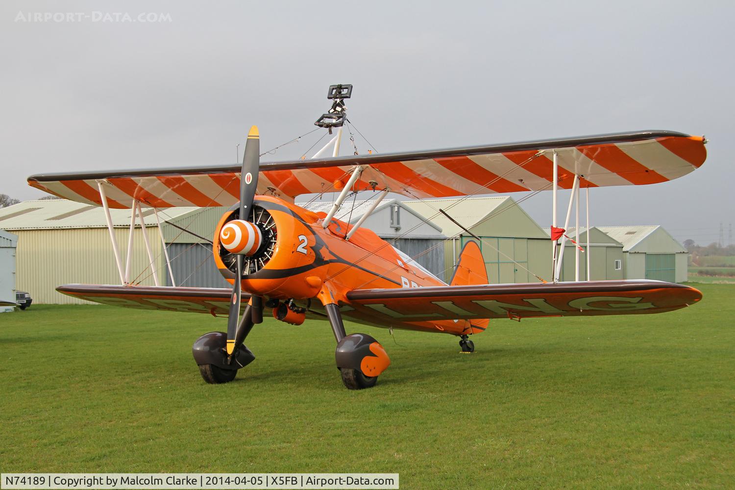 N74189, 1941 Boeing PT-17/R985 Kaydet (A75N1) C/N 75-717, The Breitling Teams Boeing PT-17 N74189, overnighting at Fishburn prior to a first UK performance in 2014 at Littlehaven's Promenade & Seawall opening celebrations, South Shields. April 5th 2014.