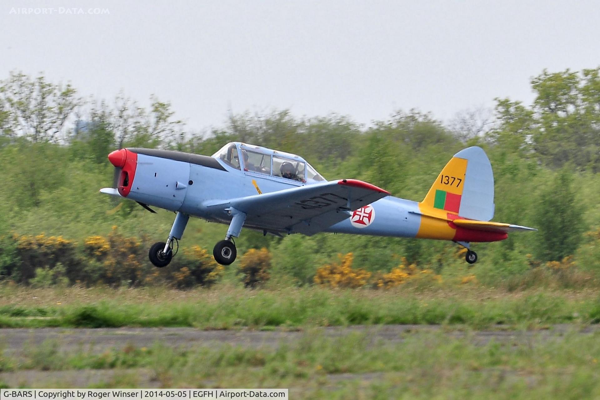 G-BARS, 1952 De Havilland DHC-1 Chipmunk T.10 C/N C1/0557, Visiting Chipmunk departing Runway 10. The aircraft served in the RAF as WK520. Painted to represent a Chipmunk in the Portuguese Air Force with the s/n 1377. 