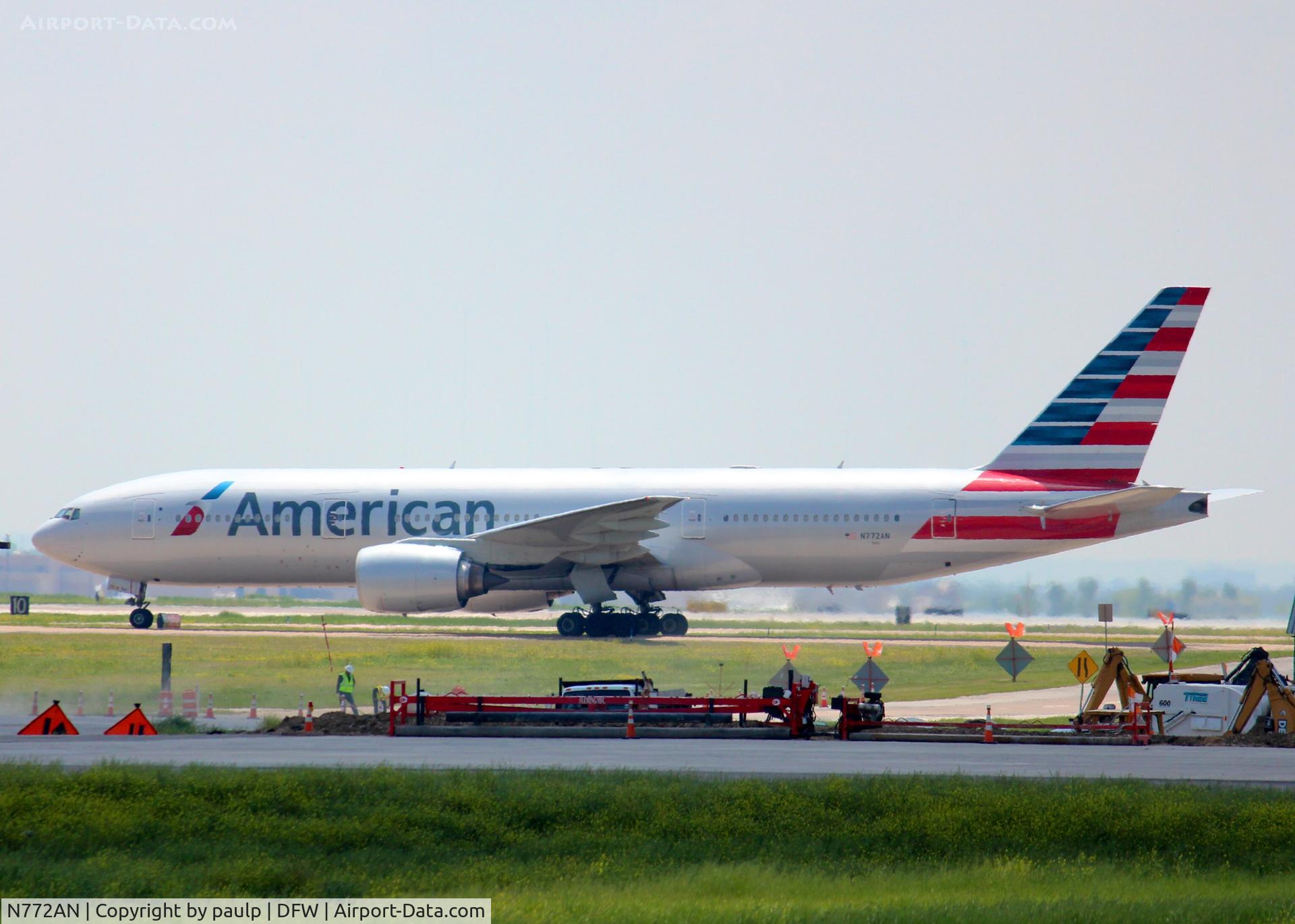 N772AN, 1999 Boeing 777-223 C/N 29580, Coming out of the maintenance hanger at DFW.