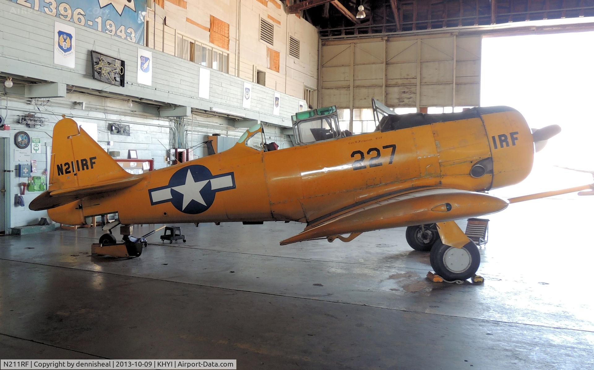 N211RF, 1957 North American AT-6C C/N 88-9419, 1957 NORTH AMERICAN AT-6C IN HANGER AT SAN MARCOS