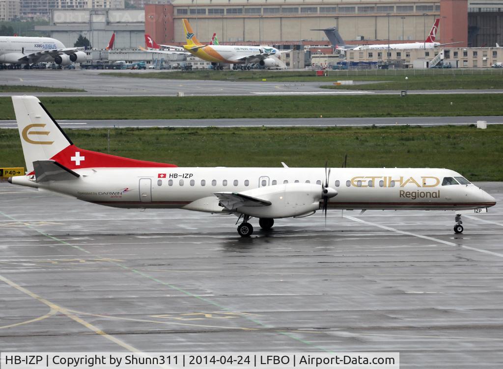 HB-IZP, 1996 Saab 2000 C/N 2000-031, Arriving at his parking...